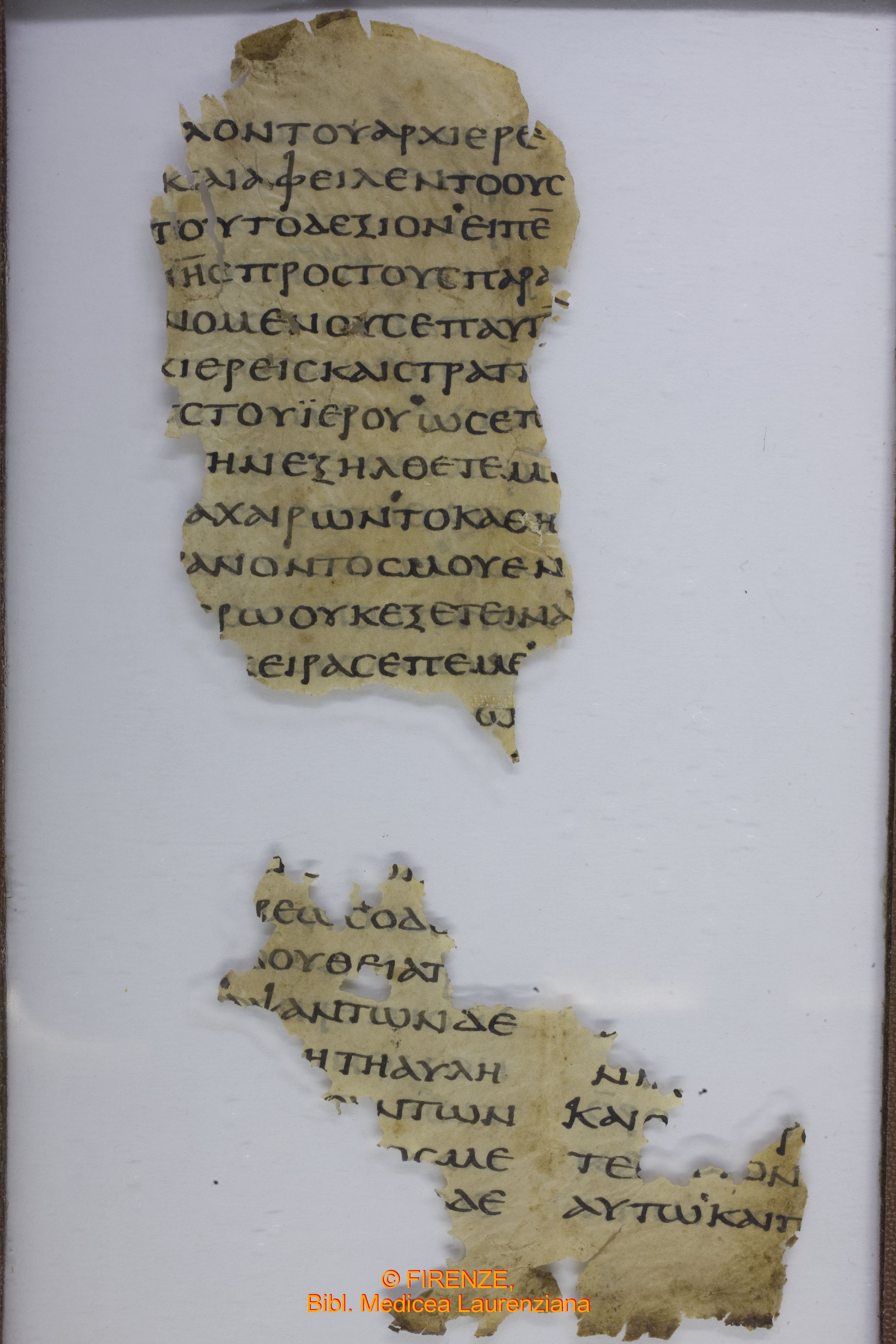 Uncial 0171 showing Luke 22:64 from Late 3rd / Early 4th Century found in Hermopolis Magna, Egypt, currently housed at Biblioteca Medicea Laurenziana, Florence / Berlin State Museums