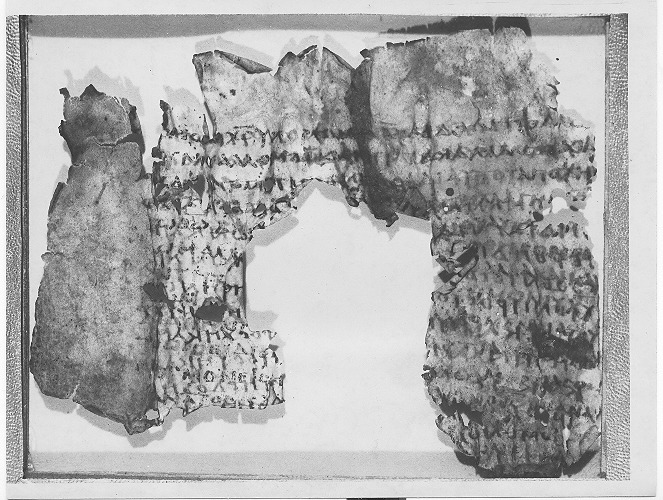 Uncial 0220 showing Romans 5:8 from 3rd Century (c. AD 250) found in Cairo, Egypt, currently housed at Museum of the Bible, Washington, D.C.
