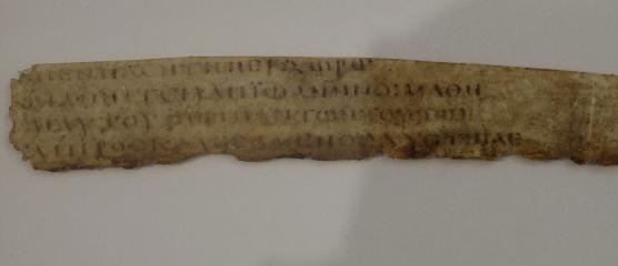 Uncial 0312 (Scan 3) showing Luke 7:18 from 3rd / 4th Century, currently housed at Corpus Christi College, Cambridge
