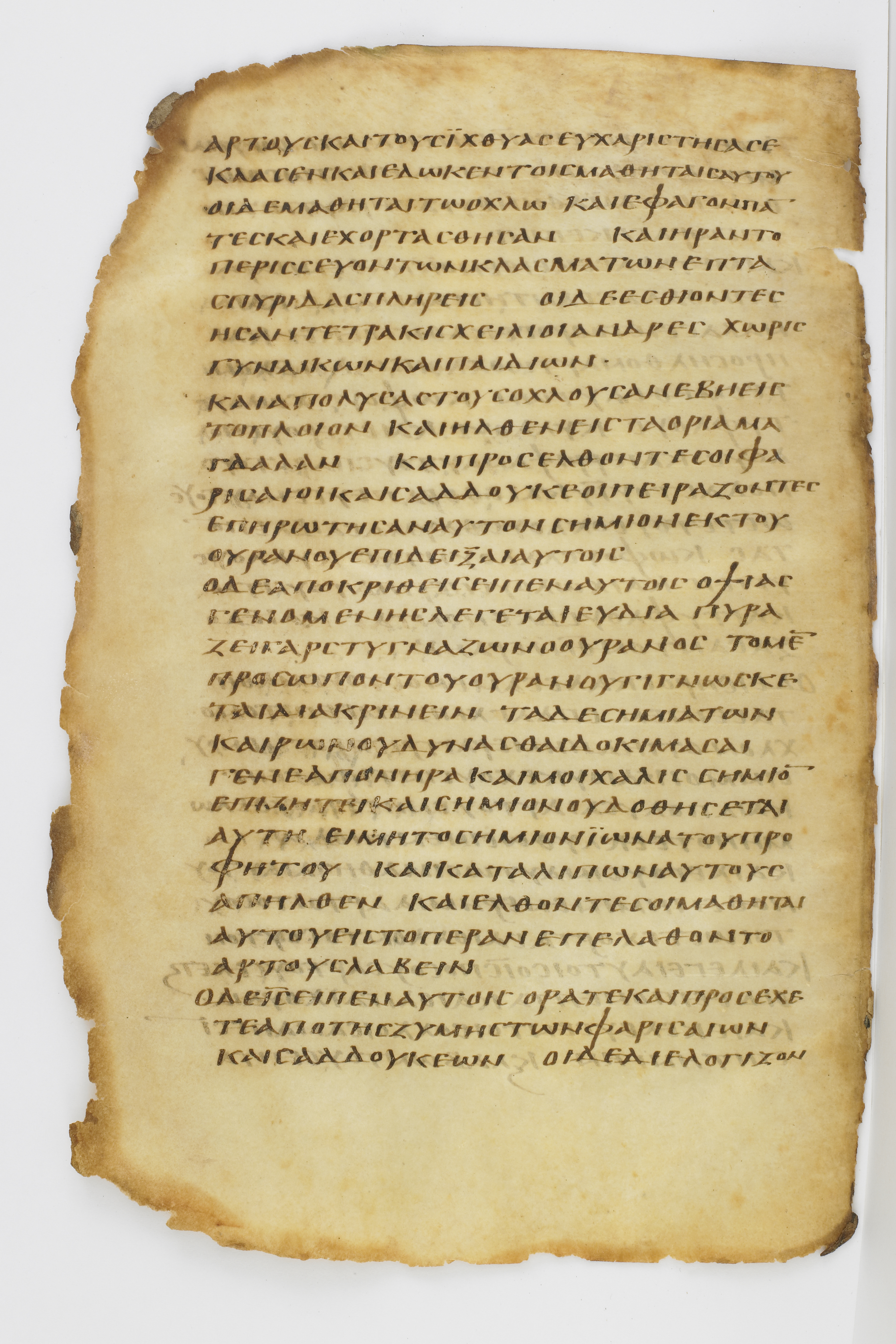 Codex Washingtonianus showing Matthew 15:39 from Late 4th to 5th Century found in Egypt (possibly near the Pyramids), currently housed at Freer Gallery of Art, Smithsonian Institution, Washington, D.C.