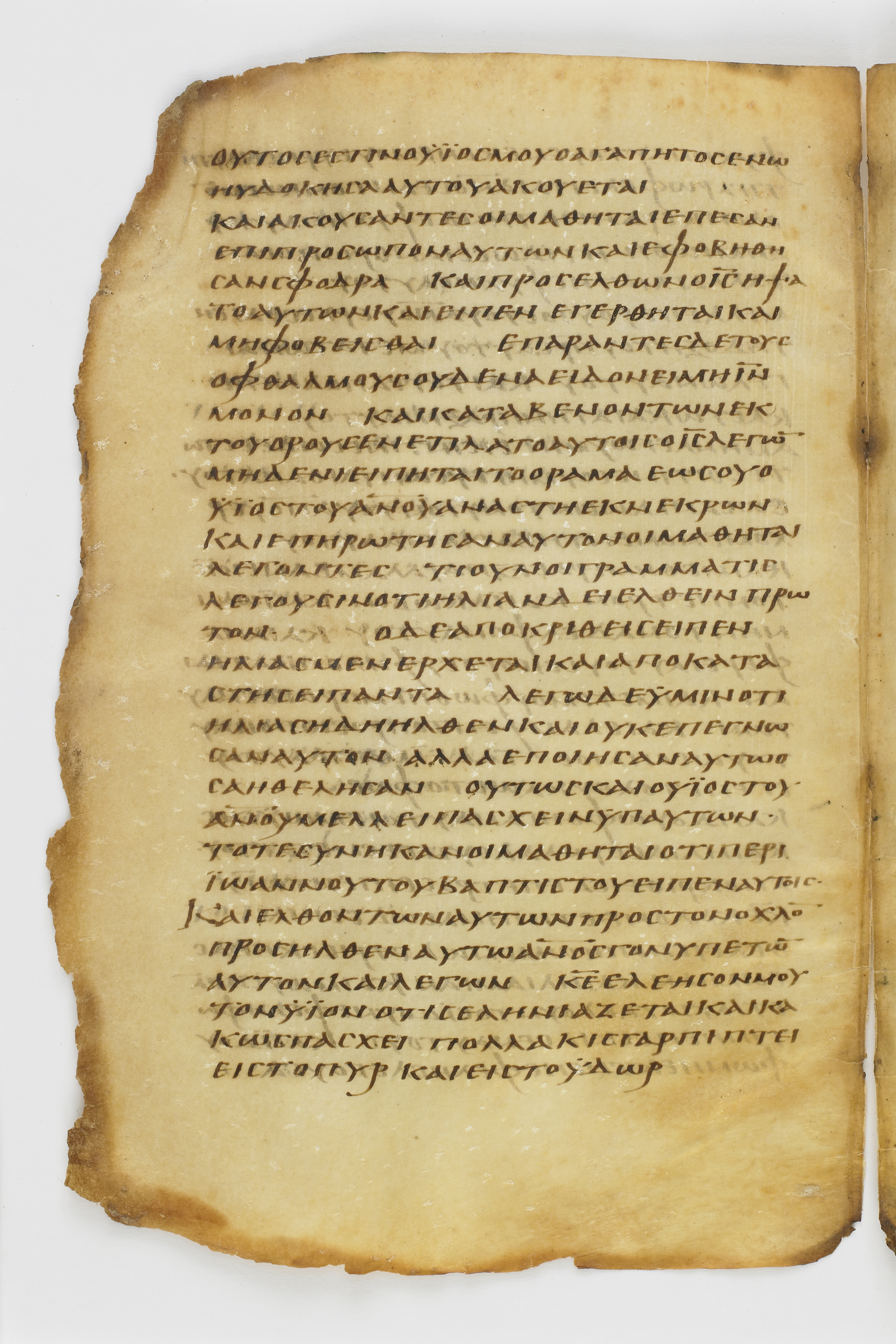 Codex Washingtonianus showing Matthew 17:7 from Late 4th to 5th Century found in Egypt (possibly near the Pyramids), currently housed at Freer Gallery of Art, Smithsonian Institution, Washington, D.C.
