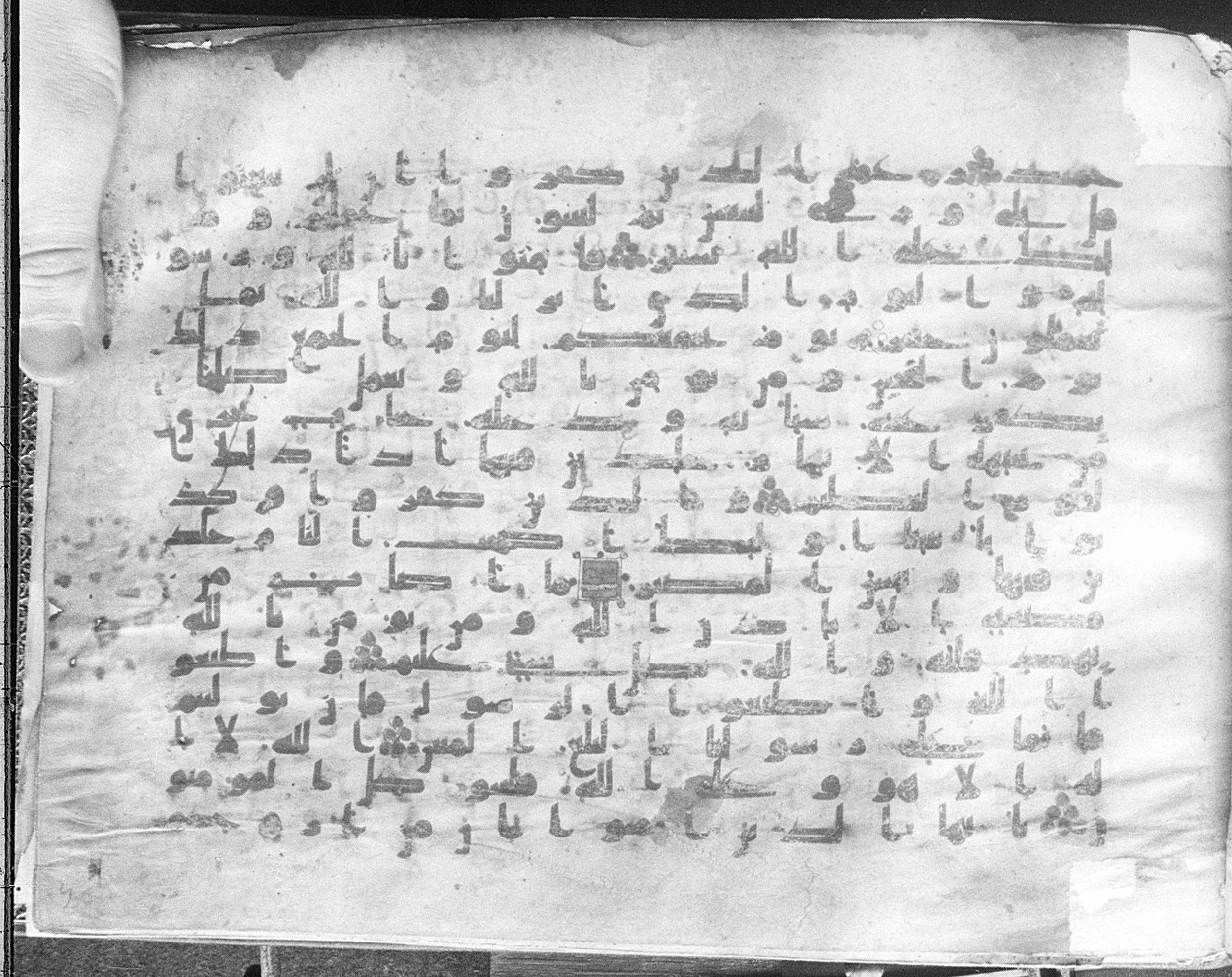 Meknes, Private library of Sherif ʿAbdarraḥmān b. Zīdān, no call number, in kūfī (type C.I) script, showing Surah 64:13 from 8th Century AD found in Meknes, Morocco, currently housed at Private library of Sherif ʿAbdarraḥmān b. Zīdān, Meknes (with fragments in Rabat, Kuwait, and private collections)