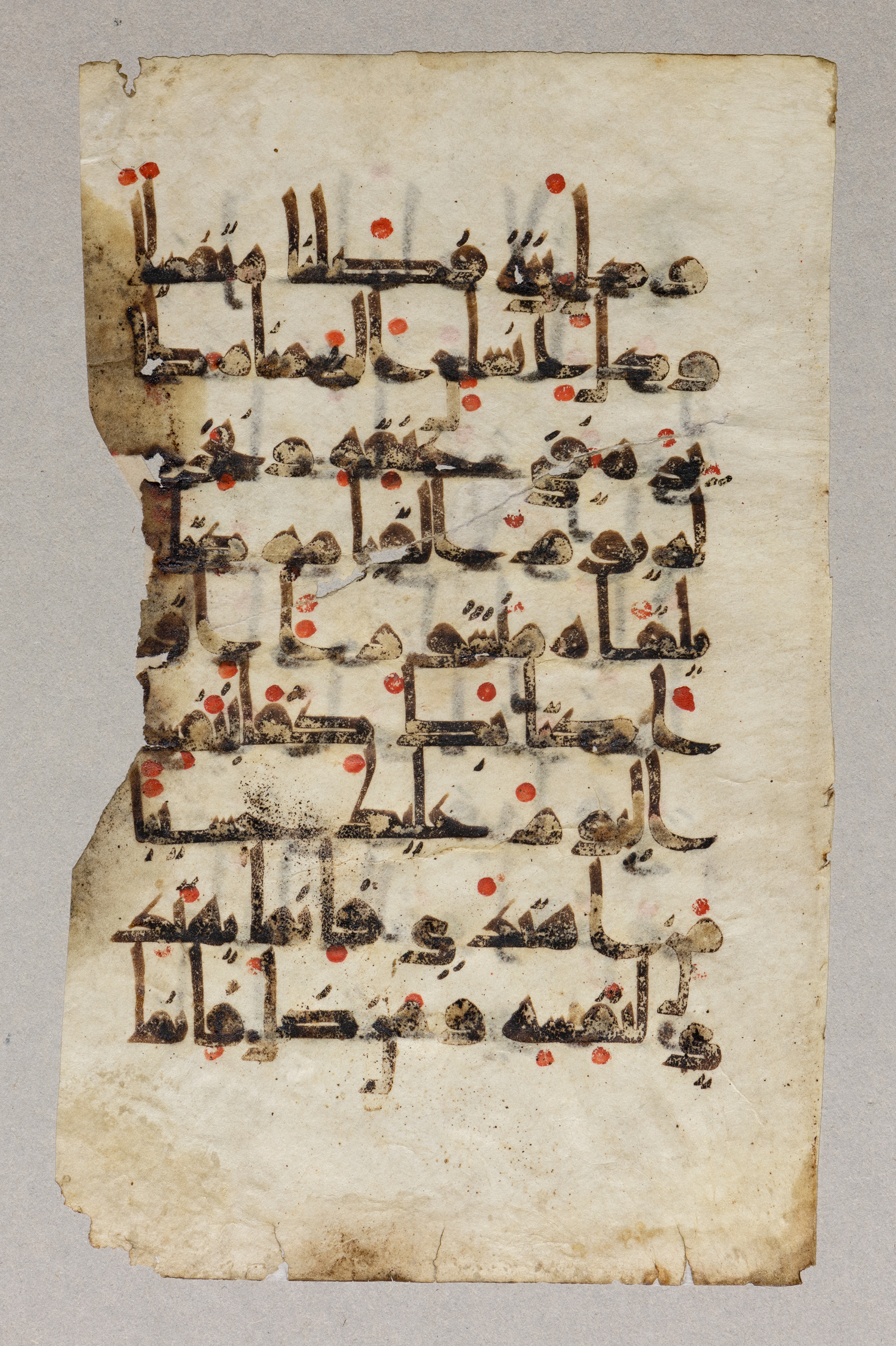 London, The British Library, Or. 2165, in ḥiǧāzī II script, showing Surah 17:13 from Mid 7th to Mid 8th Century AD found in Fustat (Old Cairo), Egypt, currently housed at The British Library, London