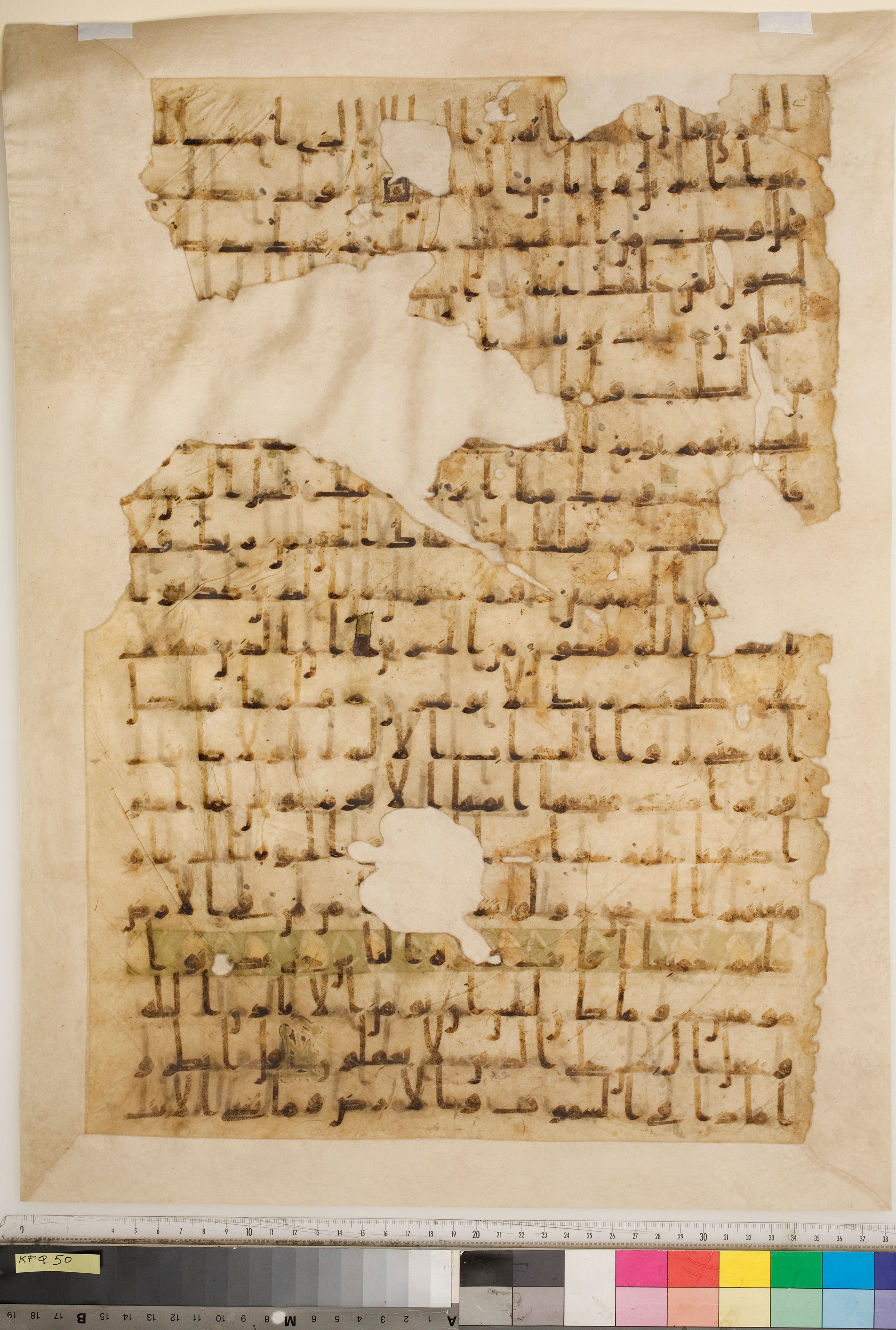 Staatsbibliothek zu Berlin, Ms. or. fol. 4313 (Scan 1), in Ḥiǧāzī (close to type II) script, showing Surah 10:97 from Mid to Late 7th Century AD found in Fustat (Old Cairo), Egypt, currently housed at Staatsbibliothek zu Berlin, Berlin