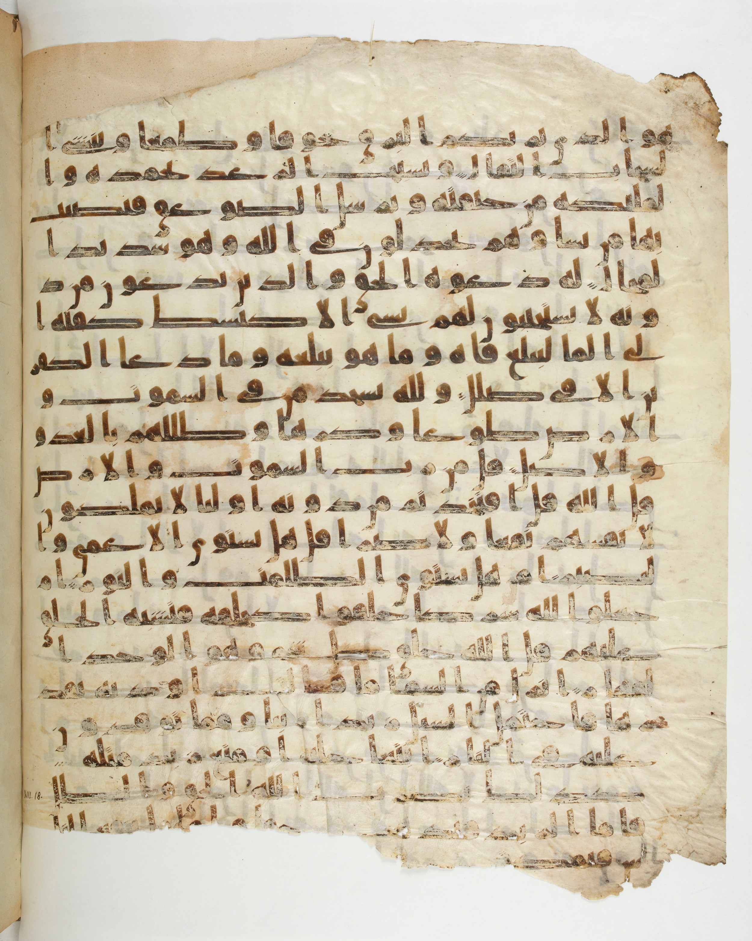 Paris, Bibliothèque nationale de France, Arabe 332, in Kūfī type C.Ia (influenced by Ḥiǧāzī IV and Kūfī B.I) script, showing Surah 13:13 from 8th Century AD found in Fustat (Old Cairo), Egypt, currently housed at Bibliothèque nationale de France, Paris