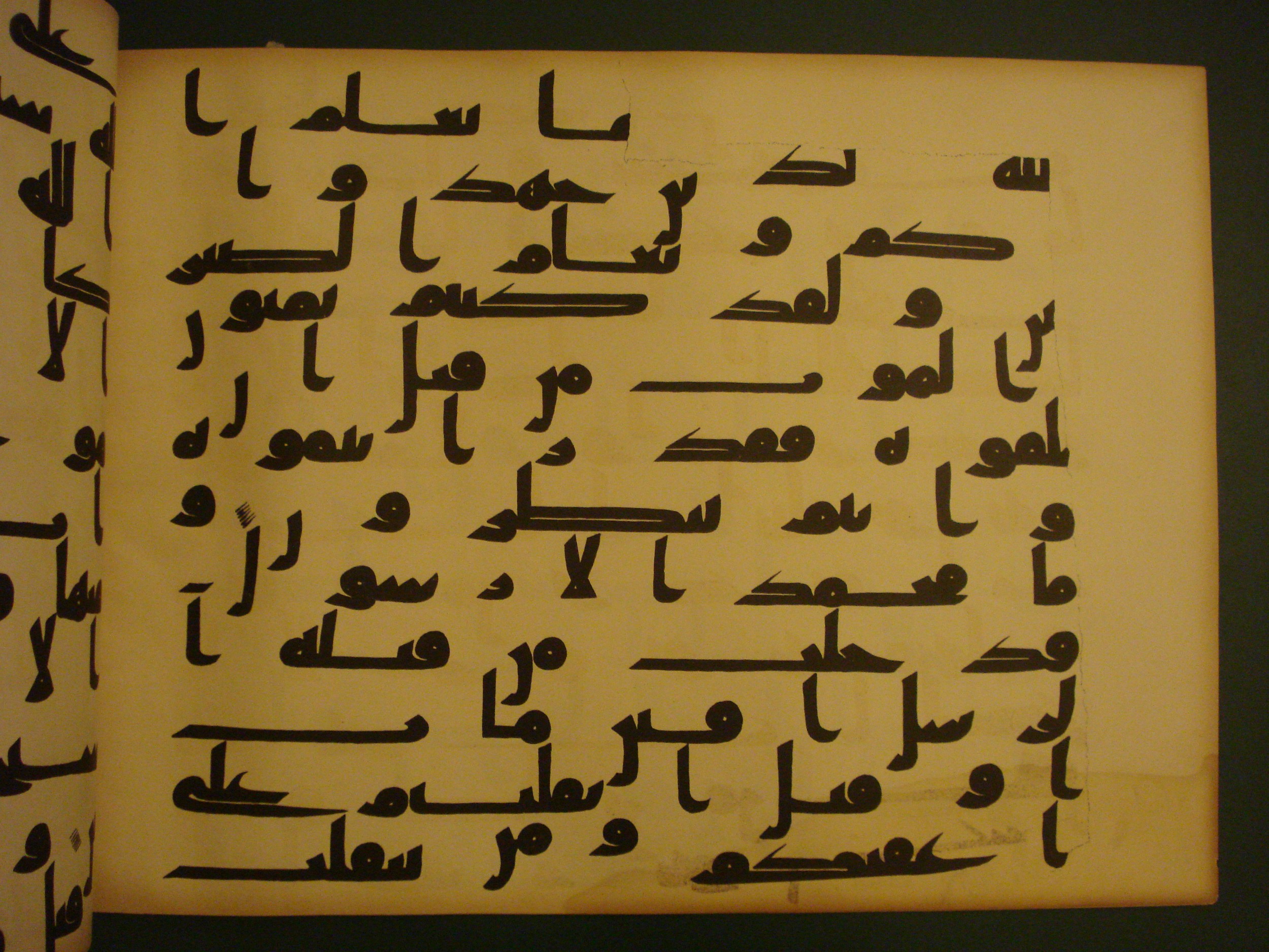 Samarkand Kufic Quran (Scan 1), in kūfī C.I script, showing Surah 3:144 from 8th Century AD found in Khoja Ahrar madrassa, Samarkand, Uzbekistan, currently housed at Center for Islamic Civilization, Tashkent, Uzbekistan