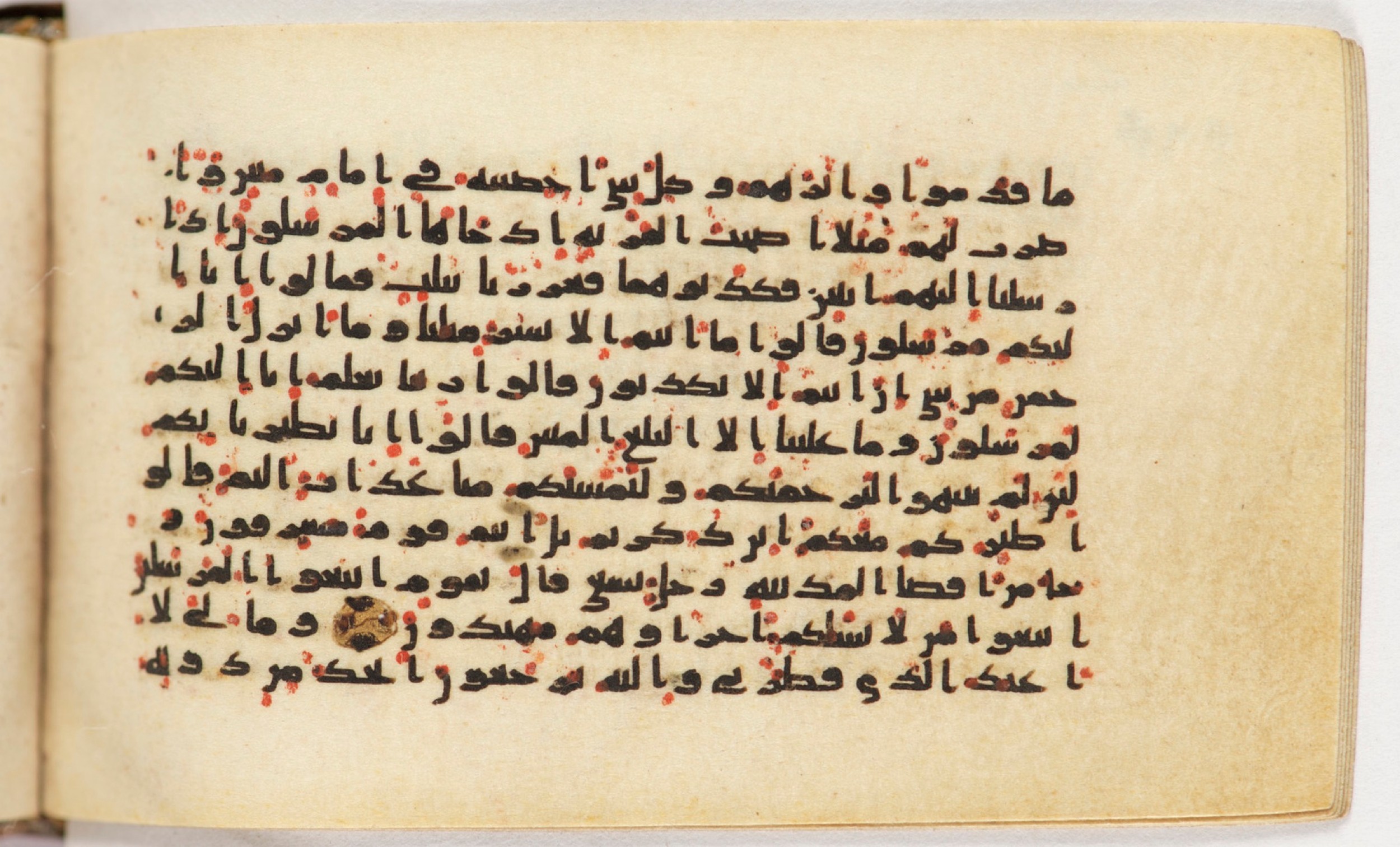 Arabe 399, in Kufic B.II script, showing Surah 36:13 from Mid-8th to Late 9th Century AD found in Unknown, currently housed at Bibliothèque nationale de France, Paris