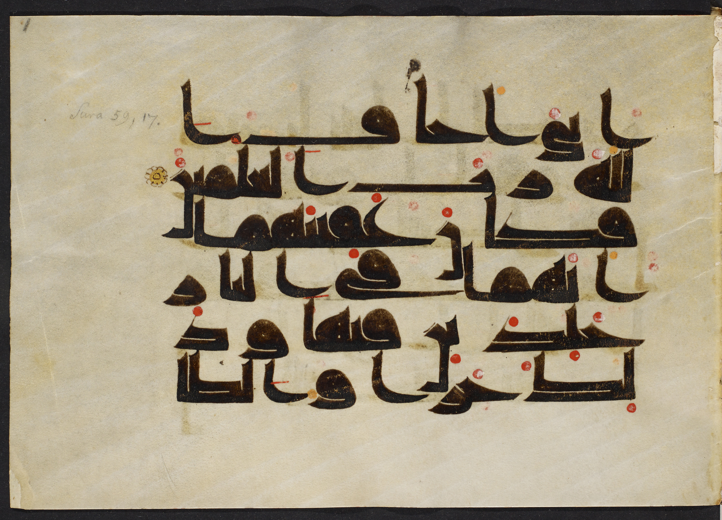Copenhagen, Det Kongelige Bibliotek, Cod. Arab. 36 (Scan 1), in kūfī D.I script, showing Surah 59:17 from Mid 8th to Late 10th Century AD found in Egypt, currently housed at Det Kongelige Bibliotek (The Royal Library), Copenhagen