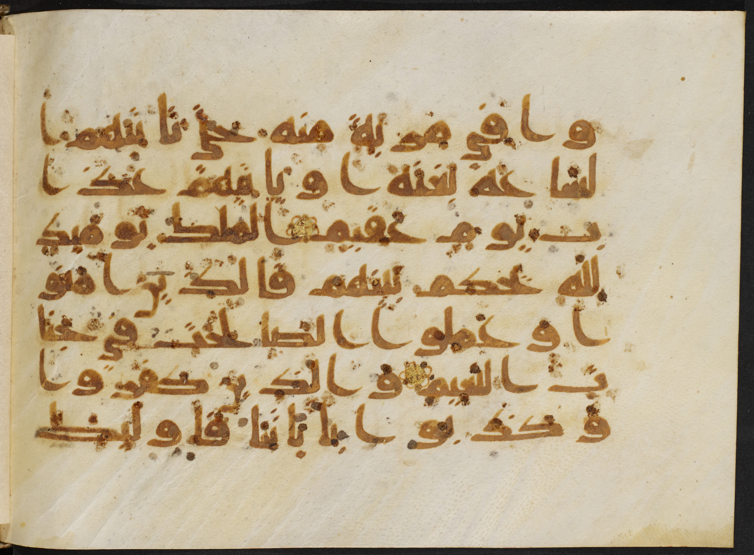 Copenhagen, Det Kongelige Bibliotek, Cod. Arab. 36 (Scan 1), in kūfī D.I script, showing Surah 22:56 from Mid 8th to Late 10th Century AD found in Egypt, currently housed at Det Kongelige Bibliotek (The Royal Library), Copenhagen