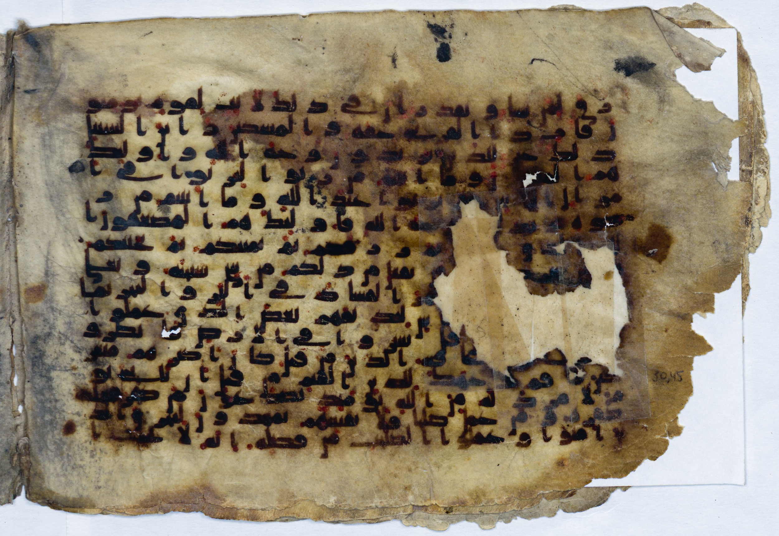 Leiden, Universiteitsbibliotheek Leiden, Or. 6814, in kūfī B.II script, showing Surah 30:40 from 8th to 9th Century AD found in Unknown (Purchased in Oegstgeest, Netherlands), currently housed at Universiteitsbibliotheek Leiden, Leiden