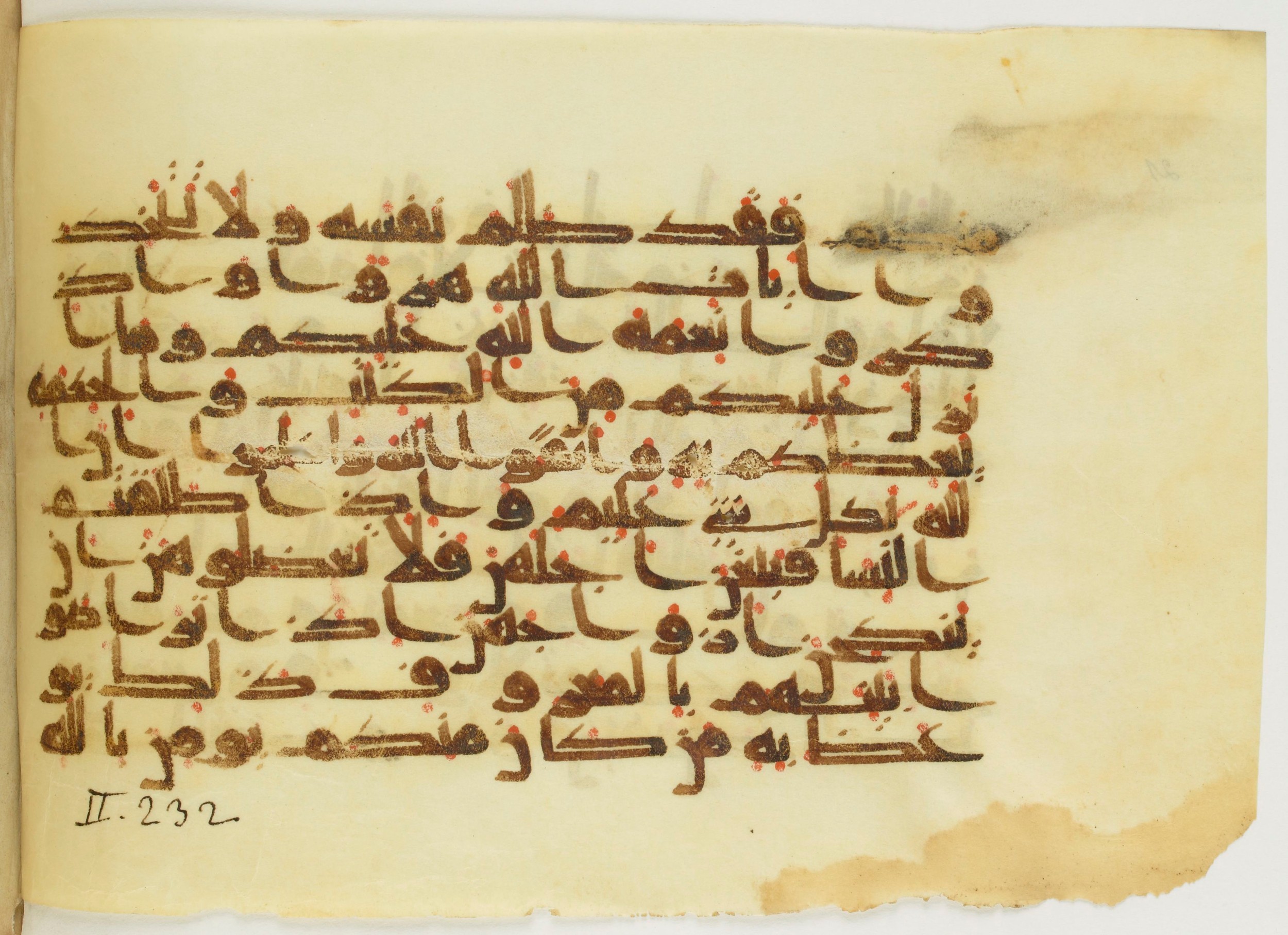 Paris, Bibliothèque nationale de France, Arabe 353 (b) (Scan 1), in Kufic Group D script, showing Surah 2:232 from Mid-8th to Late 10th Century AD found in al-Fusṭāṭ, Egypt, currently housed at Bibliothèque nationale de France, Paris