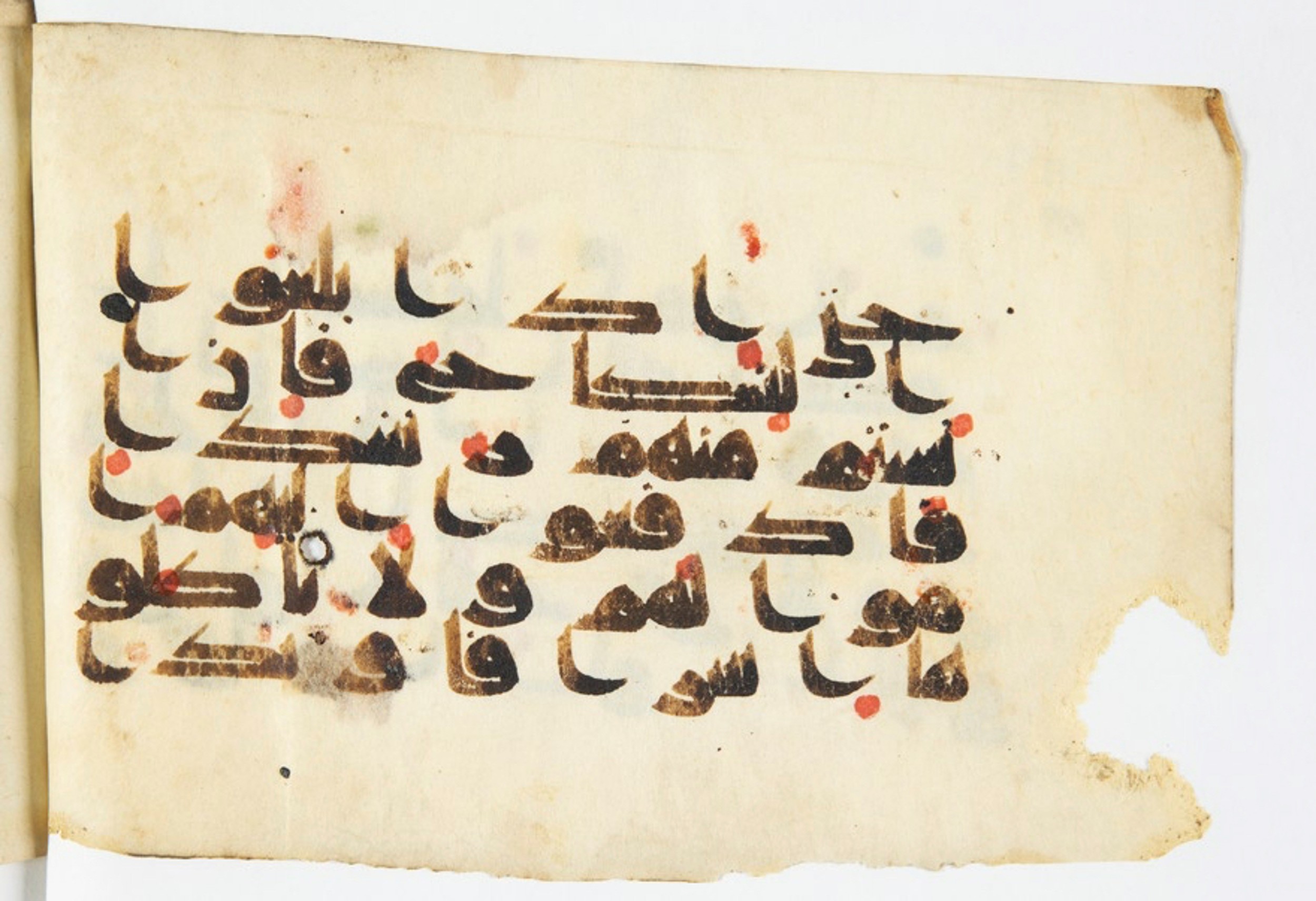 Arabe 375a (Scan 2), in Kūfī D script, showing Surah 4:6 from 9th to 10th Century AD found in Fustat (Old Cairo), Egypt, currently housed at Bibliothèque nationale de France, Paris