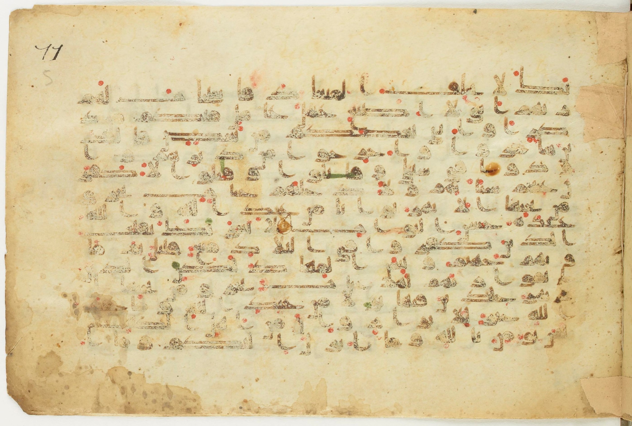 BnF Arabe 5123 (Scan 1), in Kufic D.I / D.III script, showing Surah 3:199 from 9th to 10th Century AD found in Unknown, currently housed at Bibliothèque nationale de France, Paris
