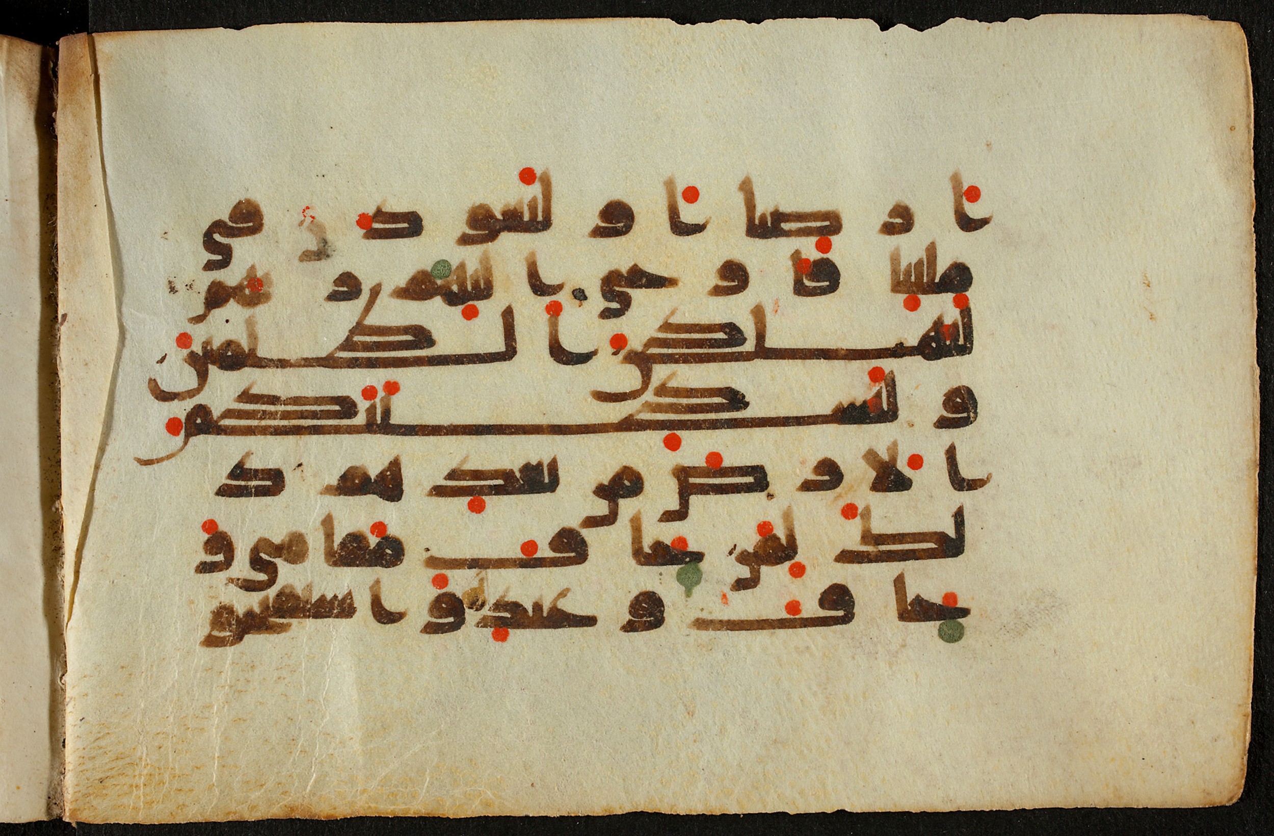 Berlin, Staatsbibliothek zu Berlin, Ms. or. quart. 1208 (VI) (Scan 2), in kūfī D.IV script, showing Surah 14:13 from 9th Century AD found in Unknown, currently housed at Staatsbibliothek zu Berlin, Berlin, Germany