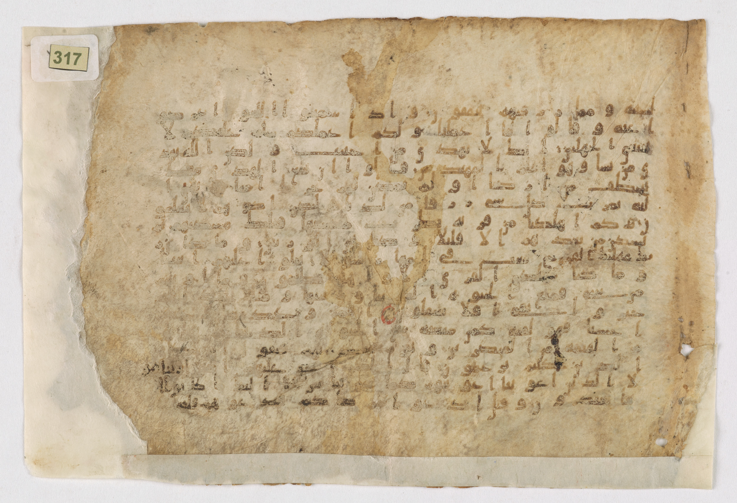 Berlin, Staatsbibliothek zu Berlin, Ms. or. quart. 1208 (XI), in Kūfī Type B.Ib script, showing Surah 28:59 from Mid 7th to Mid 8th Century AD found in Unknown, currently housed at Staatsbibliothek zu Berlin, Berlin