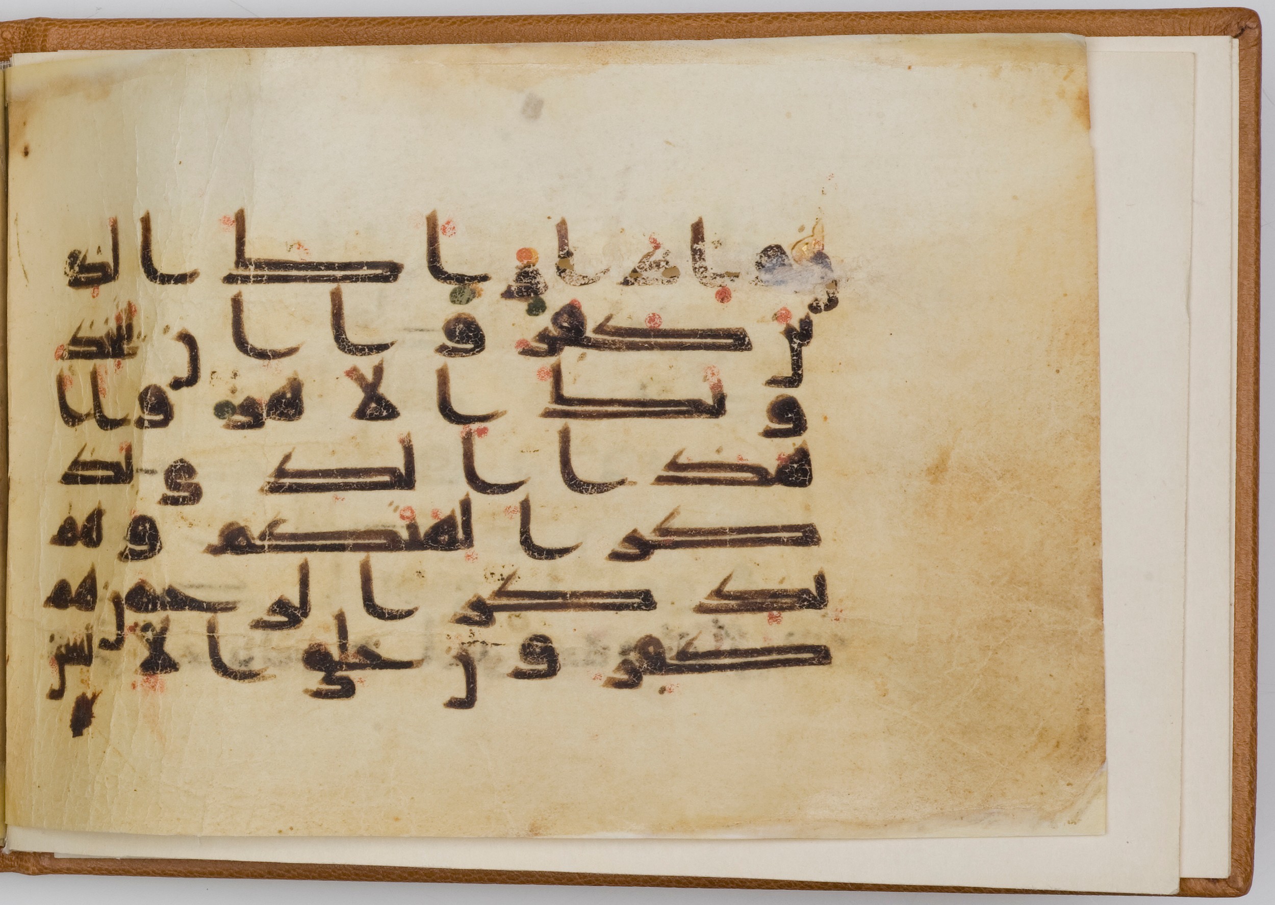 London, The Khalili Collections, QUR 49 (Scan 1), in kūfī D.Va script, showing Surah 21:35 from Late 9th / Early 10th Century AD found in Unknown, currently housed at The Khalili Collections, London