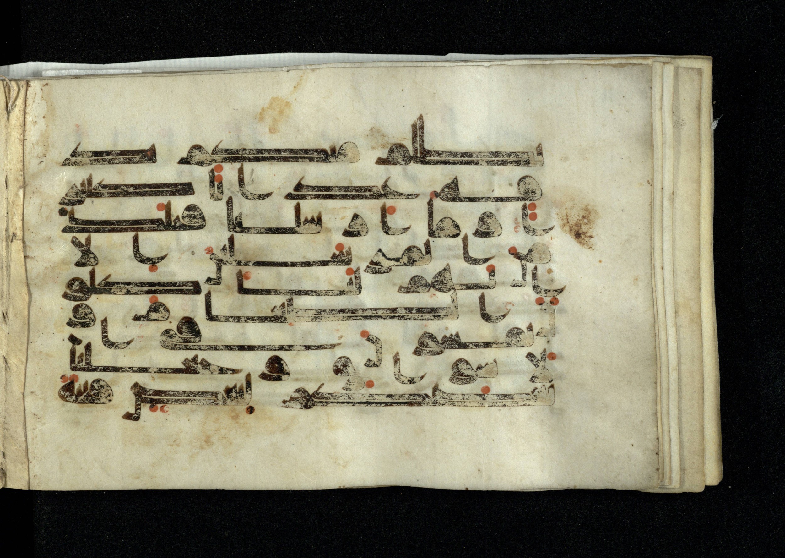 Ms. Yah. Ar. 970 (Scan 2), in kūfī D.IV script, showing Surah 25:19 from Mid 8th to Late 10th Century AD found in Unknown, currently housed at The National Library of Israel, Jerusalem