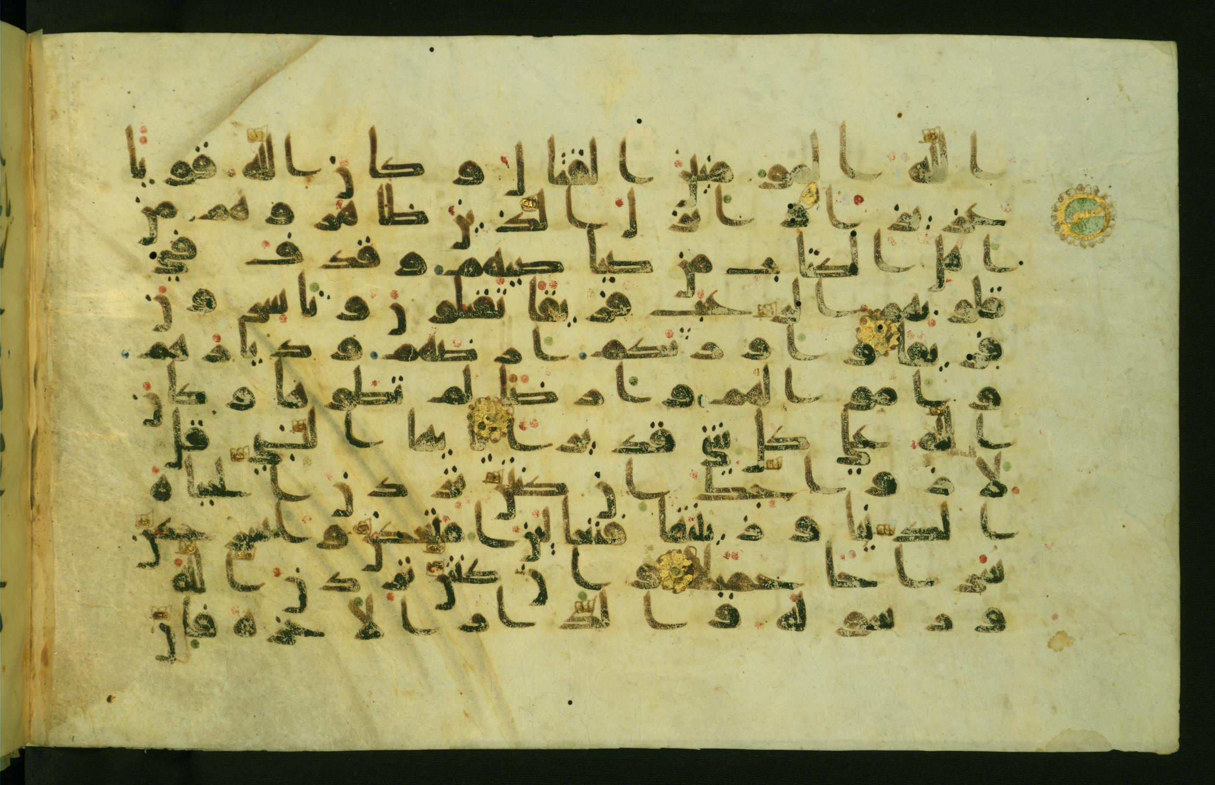 Walters W.554 (Scan 1), in Early Abbasid (Kufic) script, showing Surah 33:29 from Late 9th Century AD found in Egypt, currently housed at The Walters Art Museum, Baltimore, Maryland