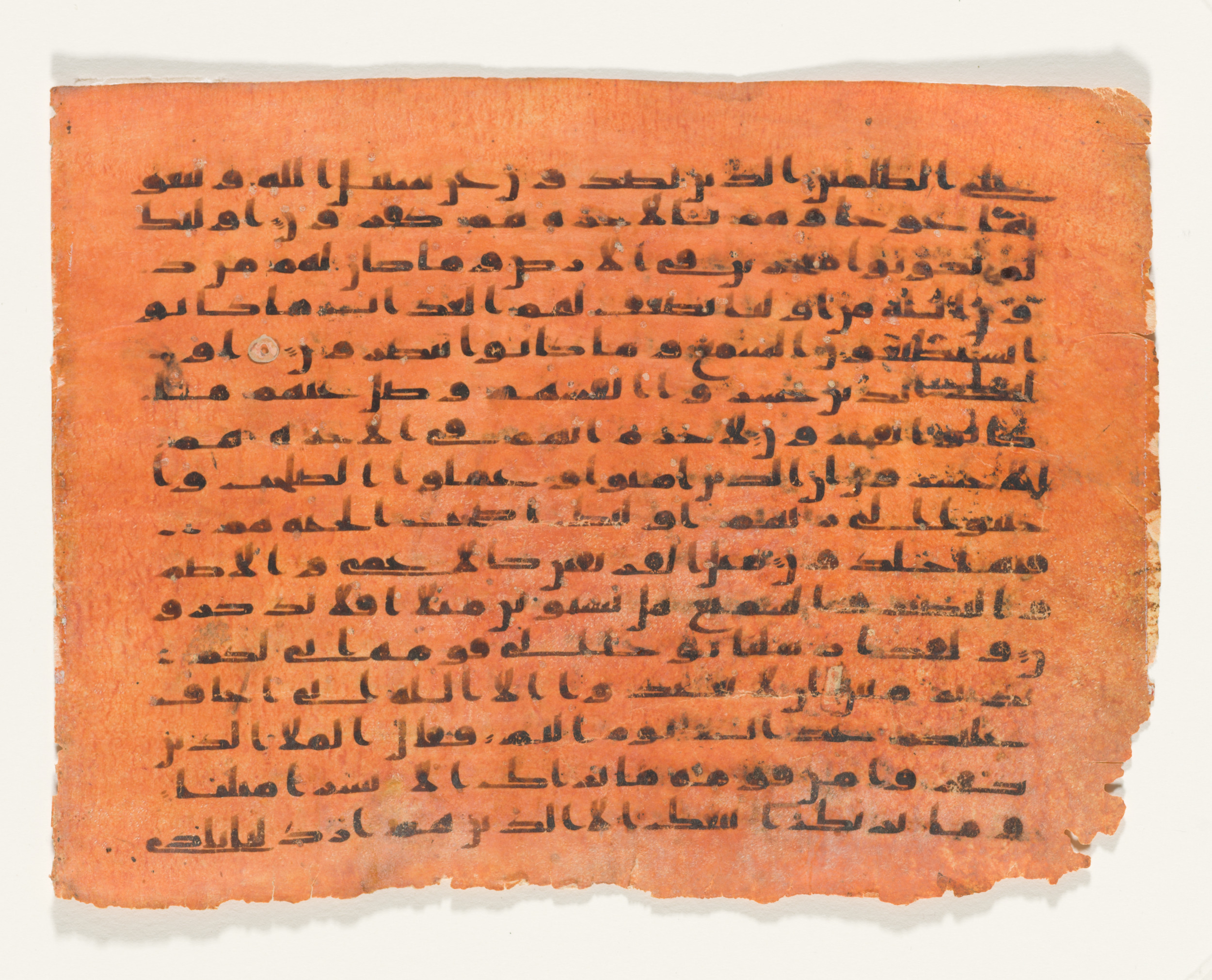 LACMA M.2002.1.389, in kūfī C script, showing Surah 11:21 from Mid 8th to Late 9th Century AD found in Unknown, currently housed at Los Angeles County Museum of Art, Los Angeles, California