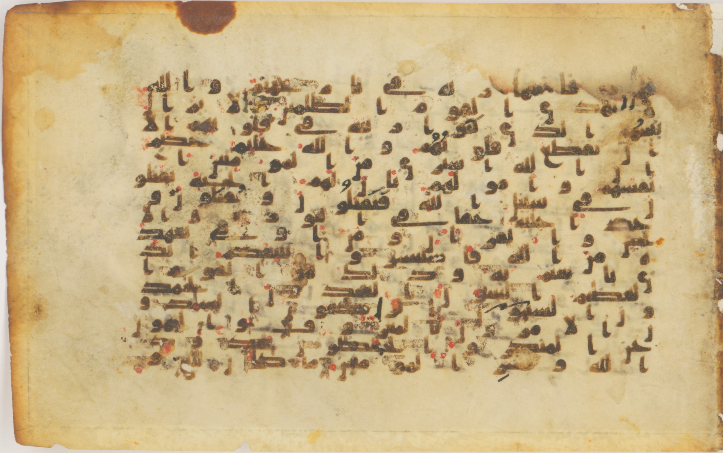 Berlin, Kunstbibliothek (Staatliche Museen zu Berlin), 1913,557 (Scan 1), in kūfī (type B II) script, showing Surah 9:113 from Early 8th to Mid 9th Century AD found in Unknown, currently housed at Kunstbibliothek (Staatliche Museen zu Berlin), Berlin