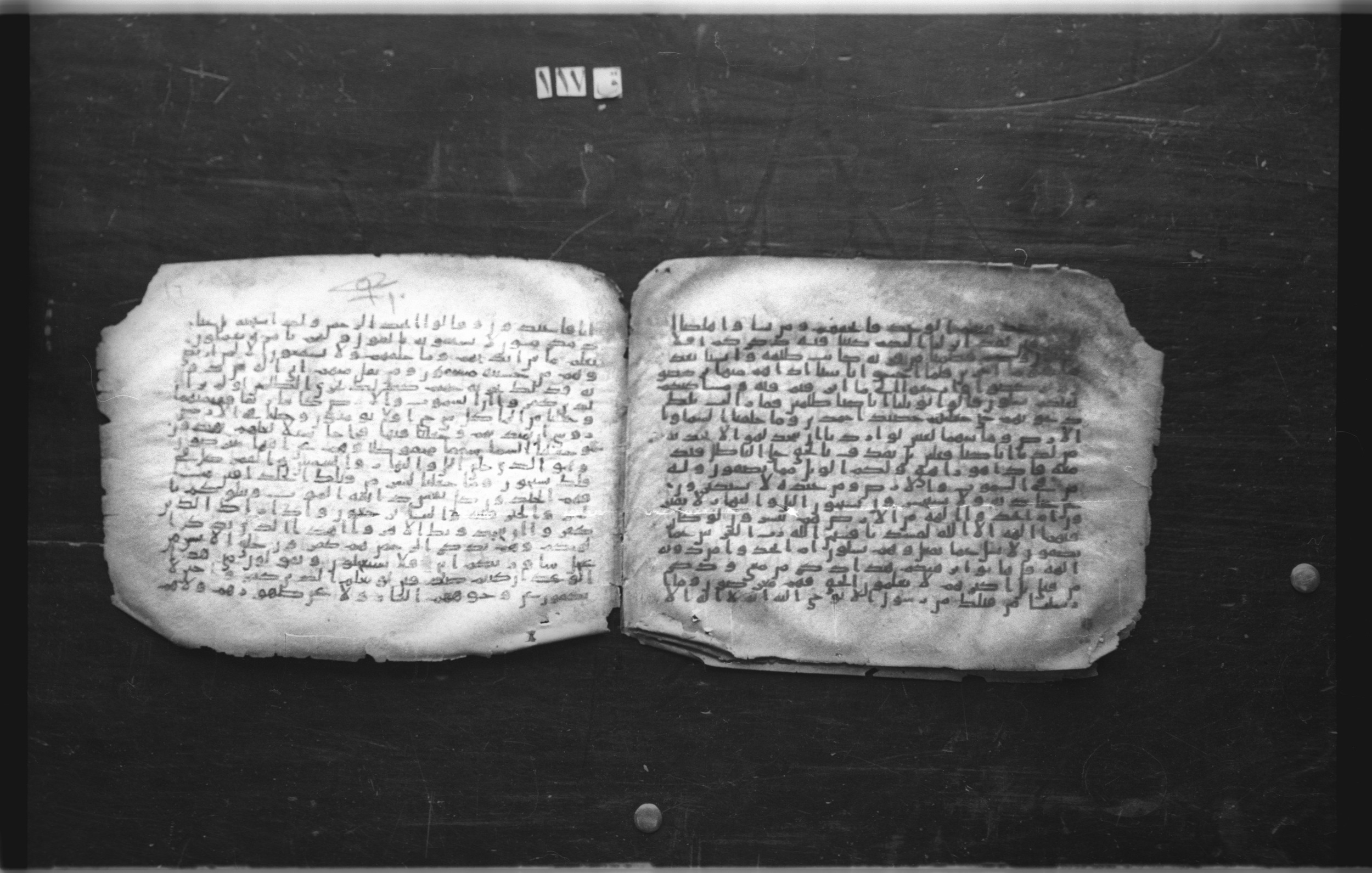 Cairo, Egyptian National Library and Archives, qāf 117 (Bergsträßer archives) (Scan 2), in Ḥiǧāzī, Kūfī (B, D), and Maġribī script, showing Surah 21:35 from Mid 7th Century to 14th Century AD found in Unknown, currently housed at Egyptian National Library and Archives (دار الكتب والوثائق القومية), Cairo
