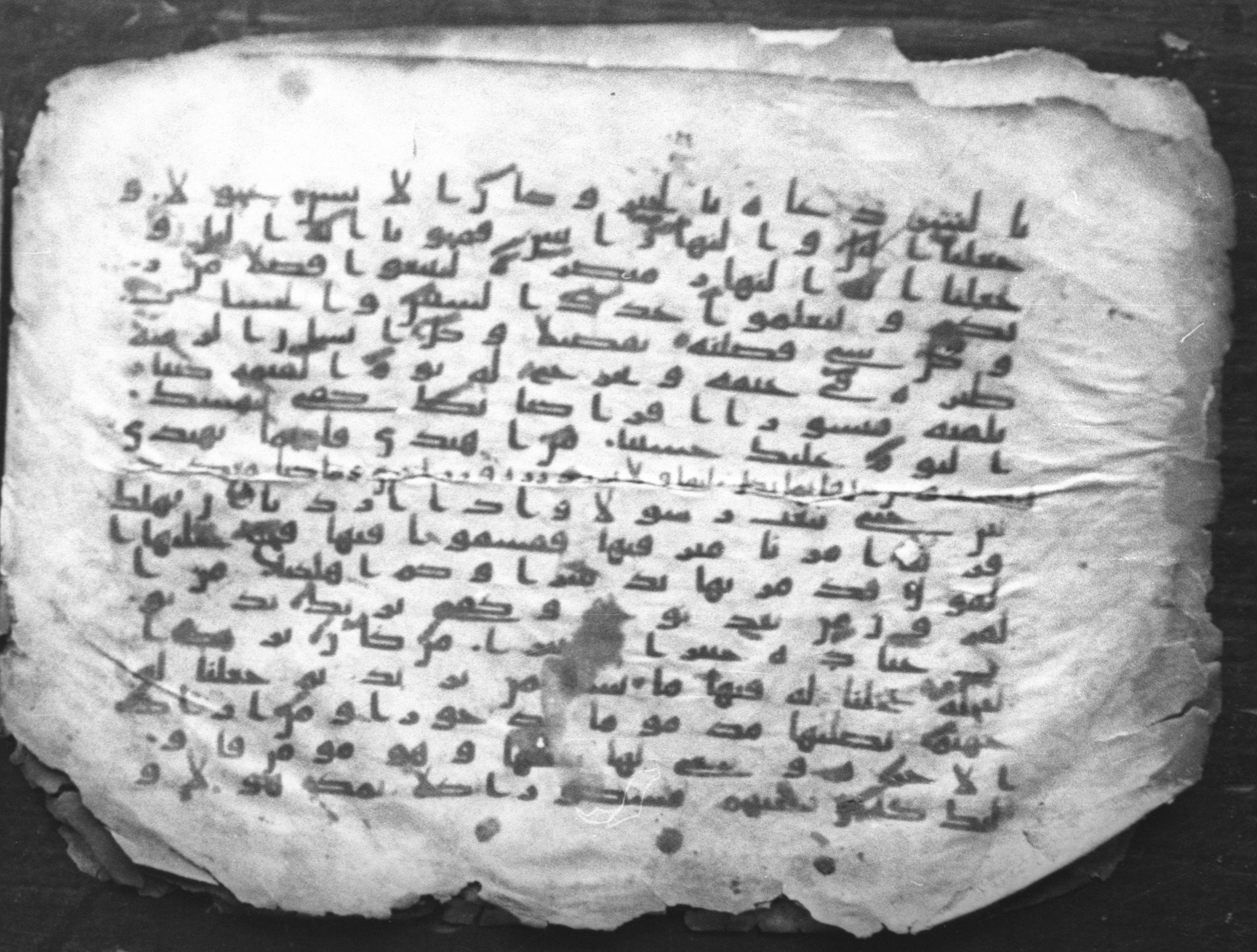 Cairo, Egyptian National Library and Archives, qāf 117 (Bergsträßer archives) (Scan 2), in Ḥiǧāzī, Kūfī (B, D), and Maġribī script, showing Surah 17:13 from Mid 7th Century to 14th Century AD found in Unknown, currently housed at Egyptian National Library and Archives (دار الكتب والوثائق القومية), Cairo