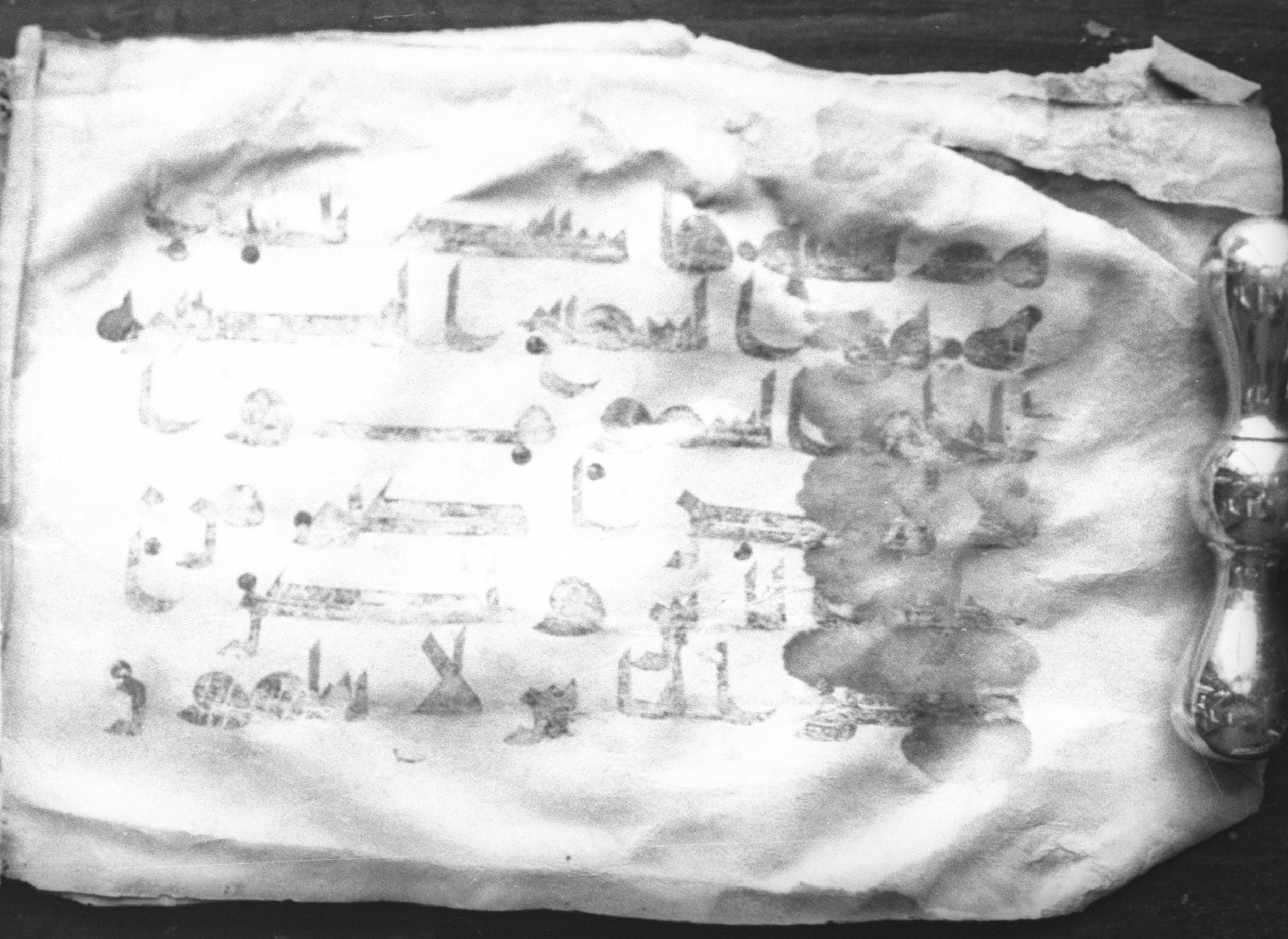 Qāf 233 (Gotthelf Bergsträßer archives) (Scan 2), in kūfī D.I, kūfī D.Va, kūfī D.Vb script, showing Surah 40:57 from Mid-8th to 9th Century AD found in Cairo, Egypt, currently housed at Egyptian National Library and Archives, Cairo
