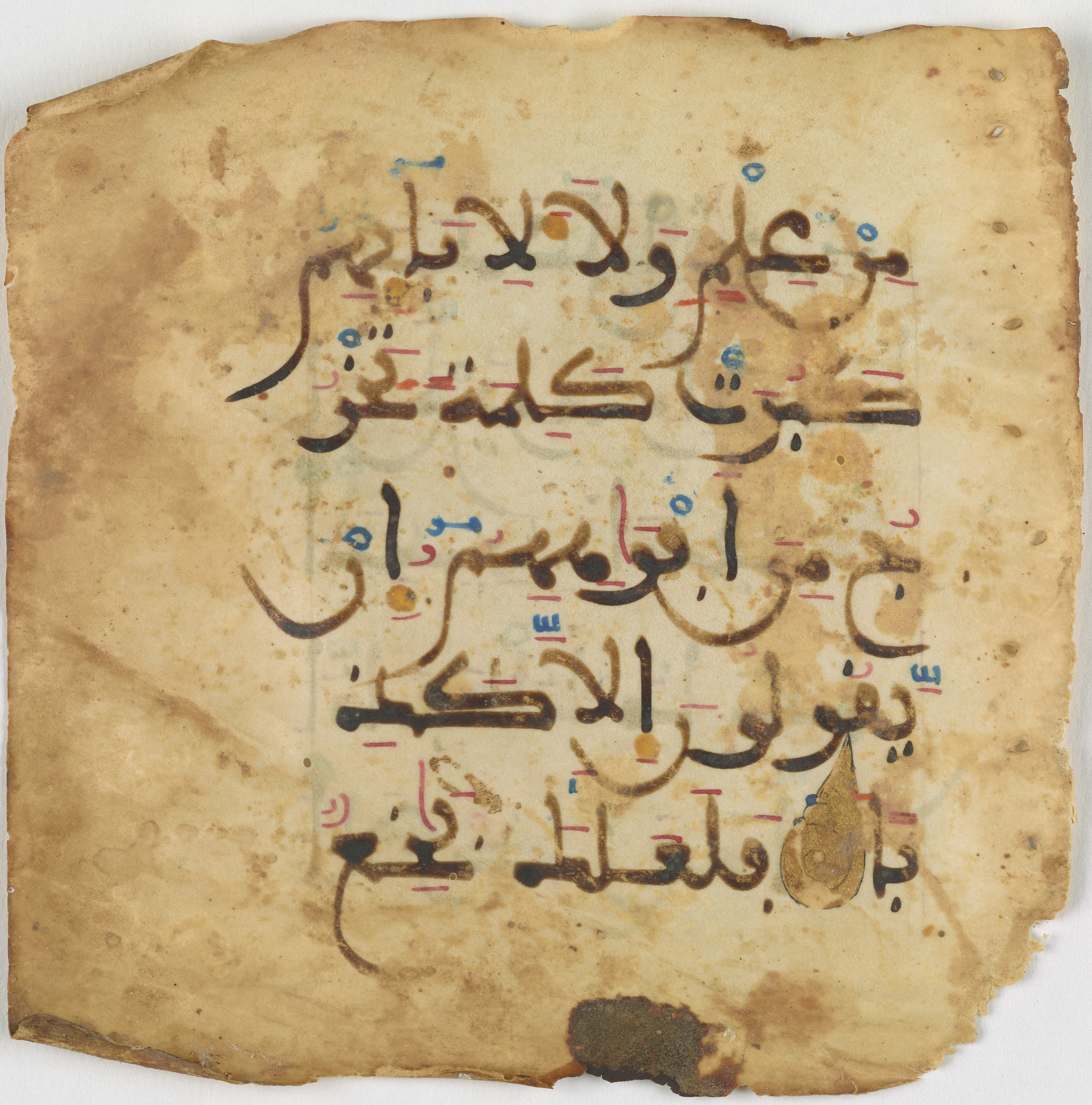 Qatar National Library, HC.MS.03094 (Scan 1), in Large Maġribī mabsūṭ script, showing Surah 18:6 from 14th Century AD found in Northwest Africa (Maghreb) or Muslim Iberia (al-Andalus), currently housed at Qatar National Library, Heritage Library, Doha