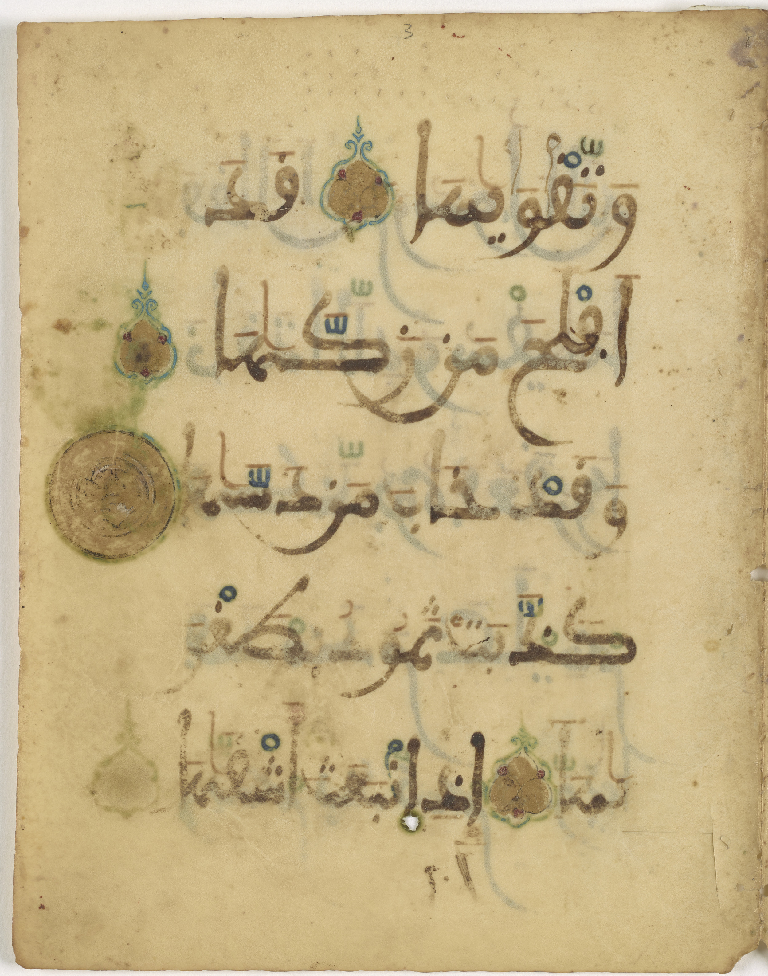 Doha, Qatar National Library, HC.MS.03173, in Large Maġribī mabsūṭ script, showing Surah 91:8 from 13th or early 14th Century AD found in North Africa (Maghreb) or Muslim Iberia (al-Andalus), currently housed at Qatar National Library, Doha