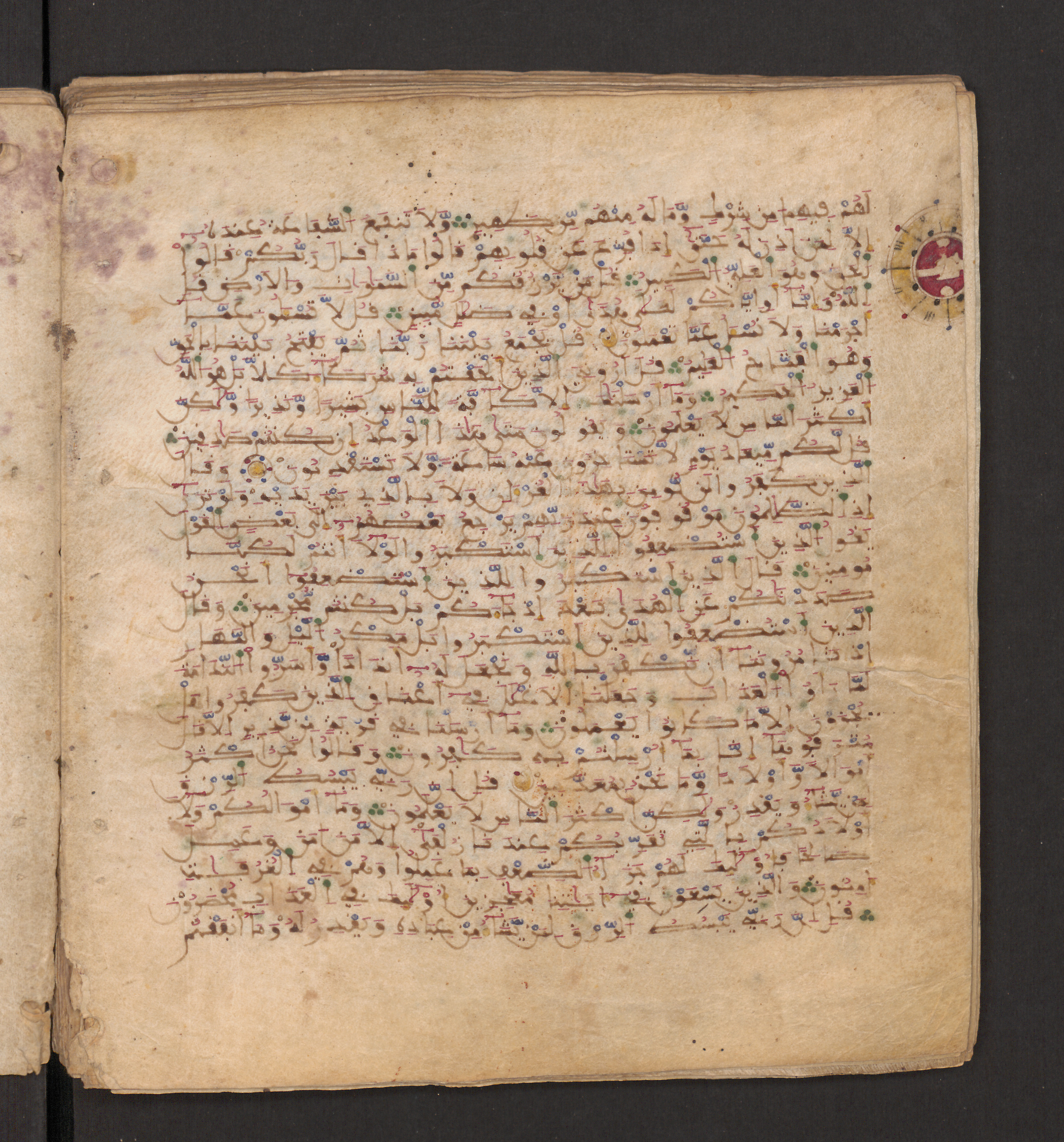 Doha, Qatar National Library, HC.MS.00715, in Maġribī micrography script, showing Surah 34:33 from 11th to 12th Century AD found in Muslim Iberia (al-Andalus), currently housed at Qatar National Library, Doha