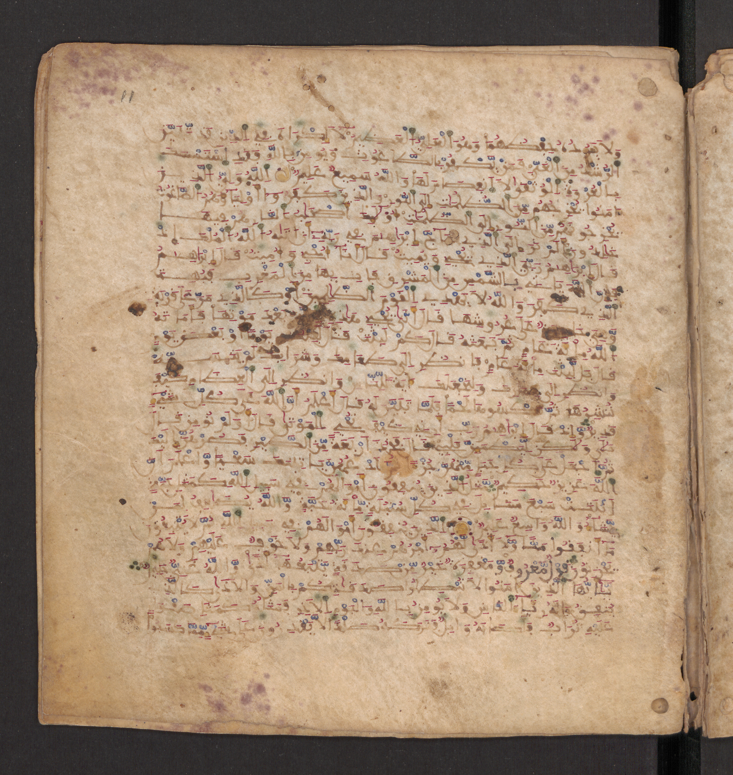 Doha, Qatar National Library, HC.MS.00715 (Scan 2), in Maġribī micrography script, showing Surah 2:255 from 11th to 12th Century AD found in Muslim Iberia (al-Andalus), currently housed at Qatar National Library, Doha