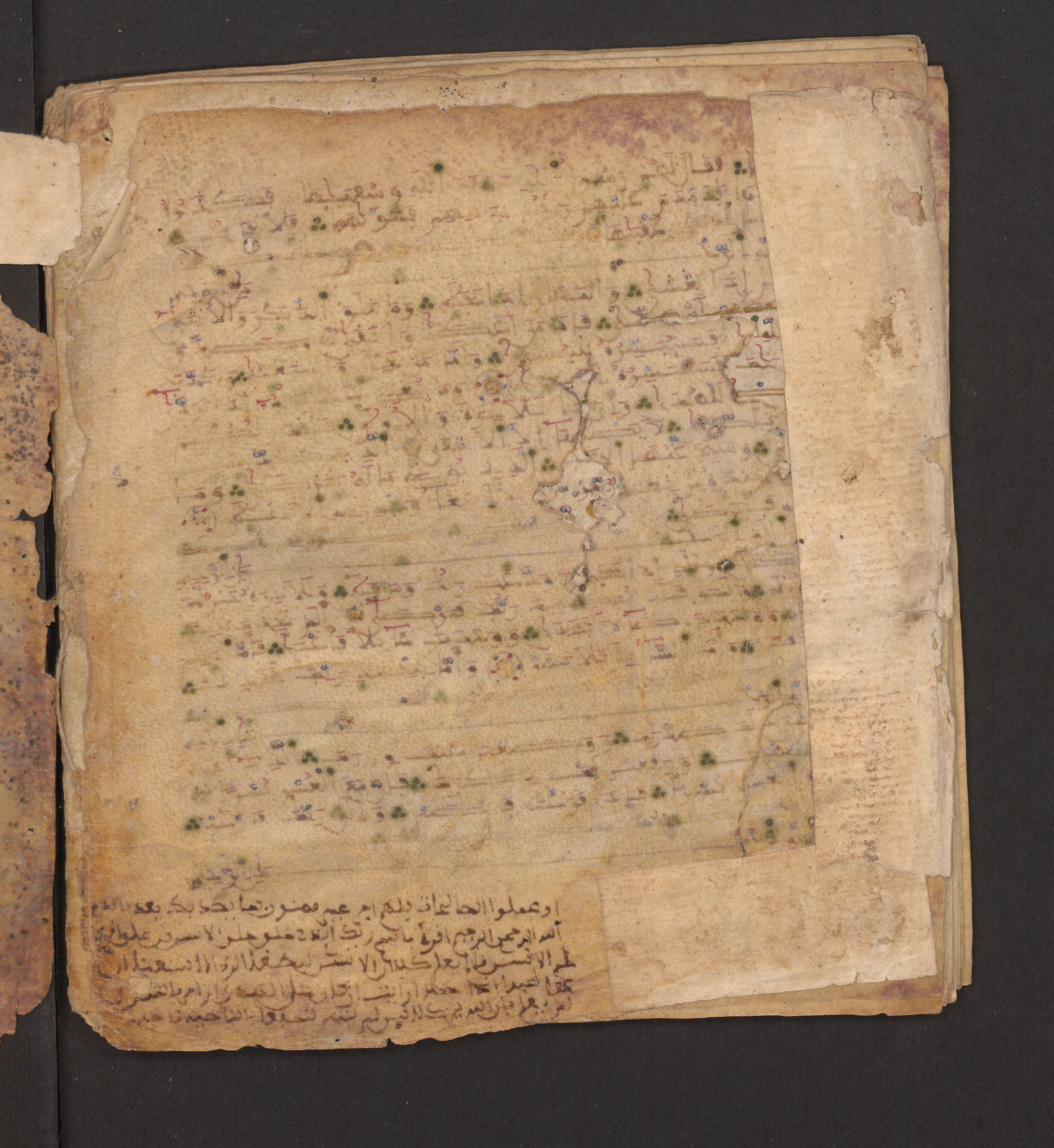 Doha, Qatar National Library, HC.MS.00715, in Maġribī micrography script, showing Surah 92:21 from 11th to 12th Century AD found in Muslim Iberia (al-Andalus), currently housed at Qatar National Library, Doha