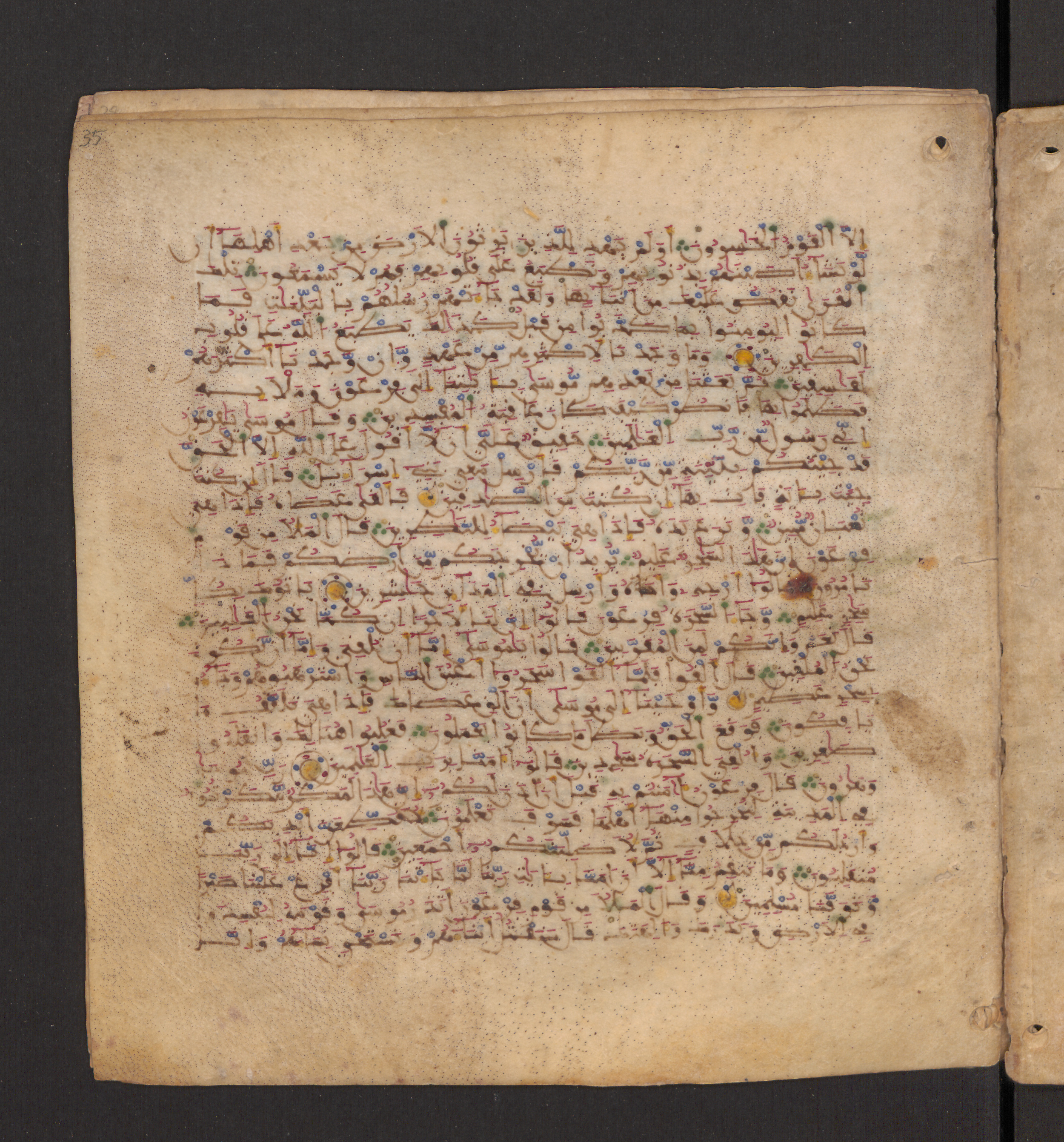 Doha, Qatar National Library, HC.MS.00715, in Maġribī micrography script, showing Surah 7:113 from 11th to 12th Century AD found in Muslim Iberia (al-Andalus), currently housed at Qatar National Library, Doha
