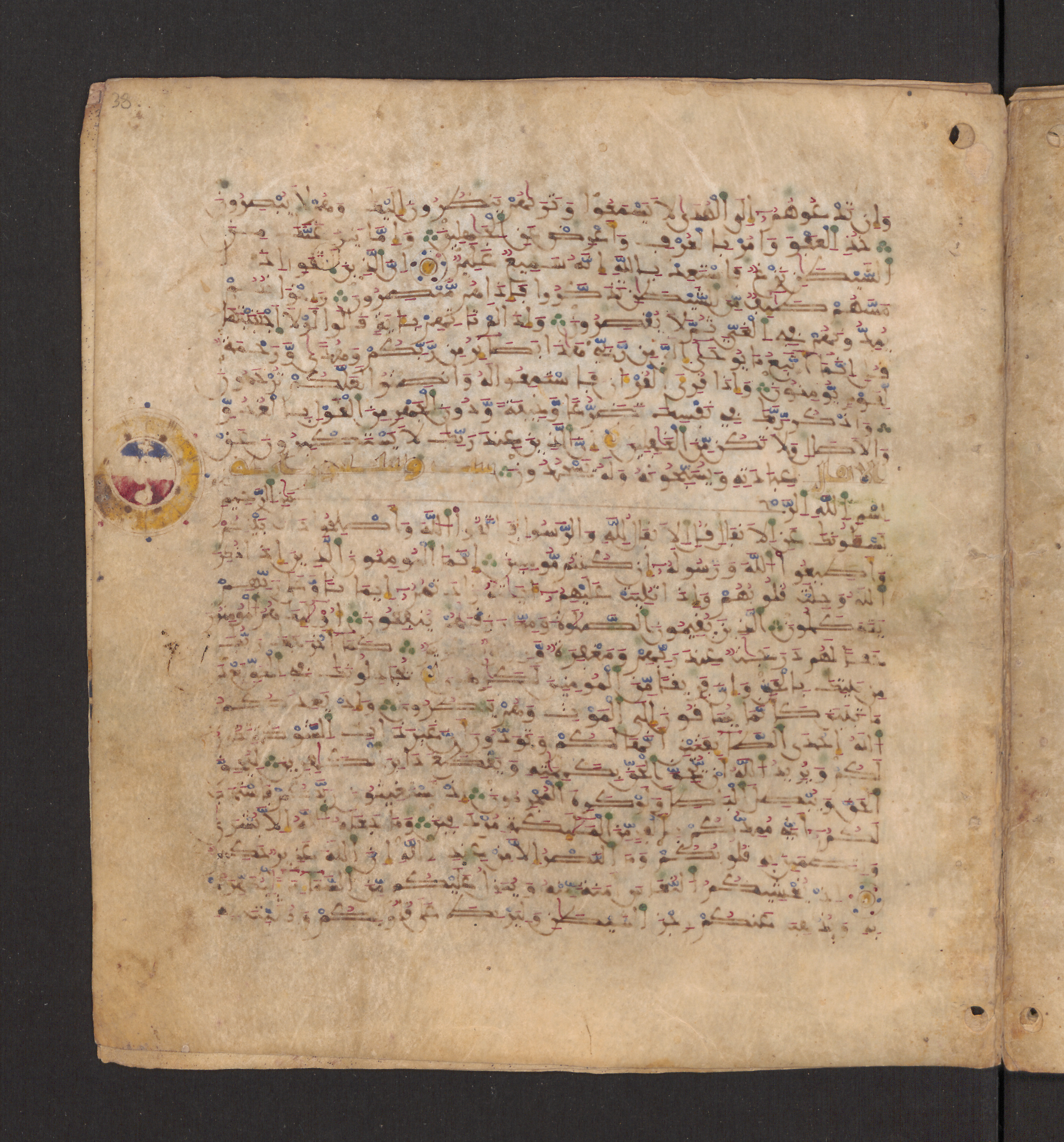 Doha, Qatar National Library, HC.MS.00715, in Maġribī micrography script, showing Surah 8:2 from 11th to 12th Century AD found in Muslim Iberia (al-Andalus), currently housed at Qatar National Library, Doha