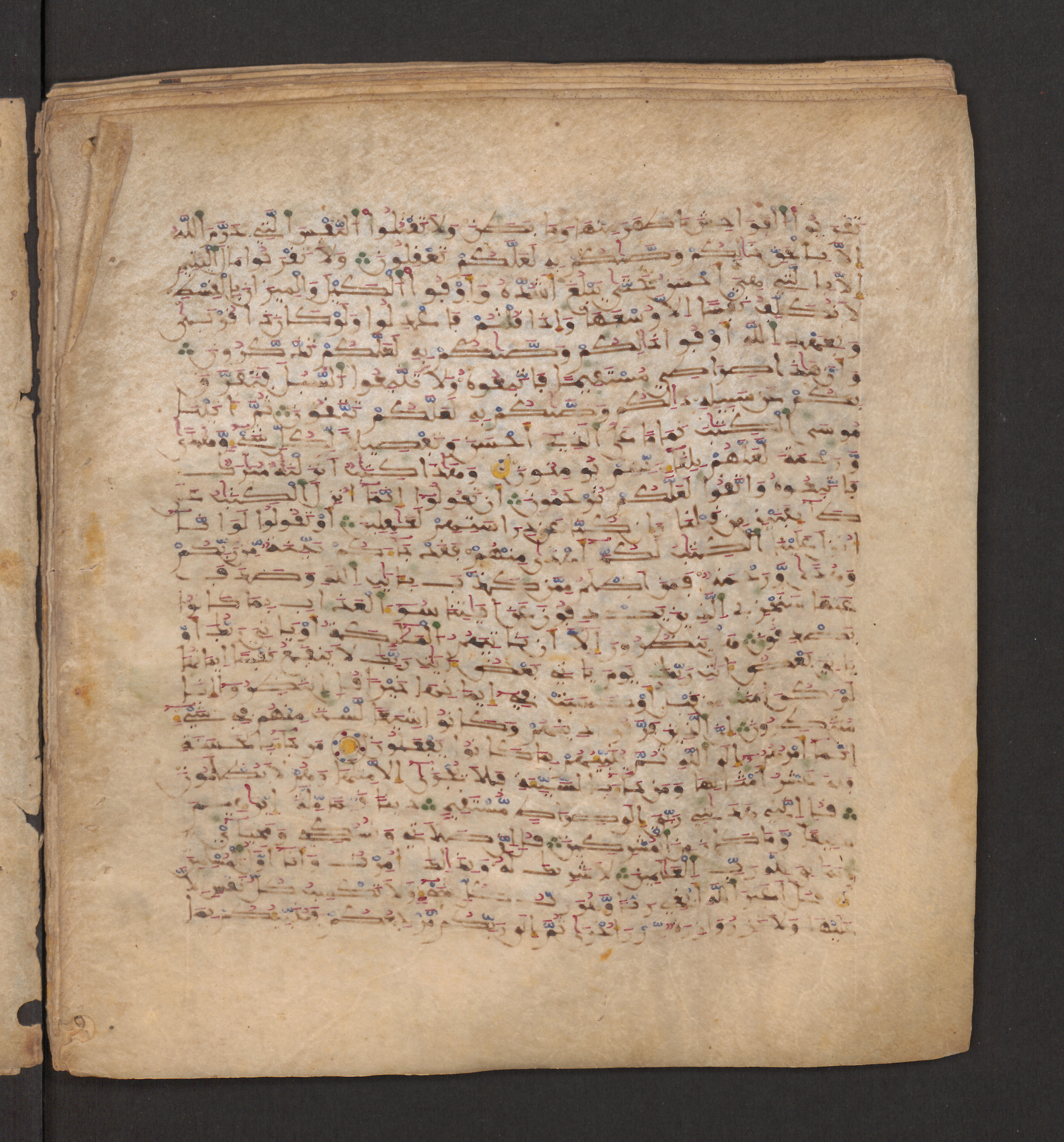 Doha, Qatar National Library, HC.MS.00715, in Maġribī micrography script, showing Surah 6:152 from 11th to 12th Century AD found in Muslim Iberia (al-Andalus), currently housed at Qatar National Library, Doha