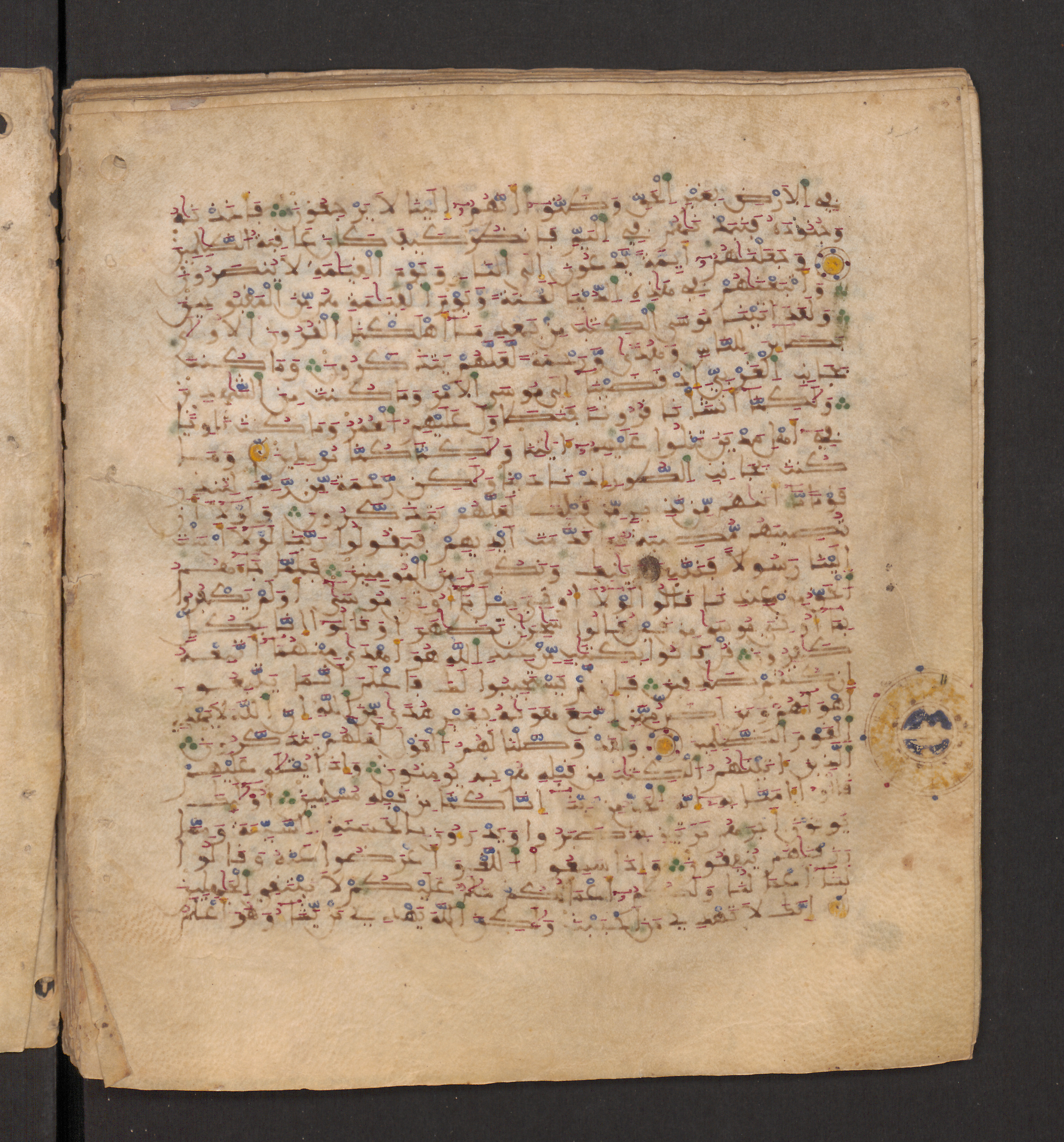 Doha, Qatar National Library, HC.MS.00715 (Scan 2), in Maġribī micrography script, showing Surah 28:39 from 11th to 12th Century AD found in Muslim Iberia (al-Andalus), currently housed at Qatar National Library, Doha