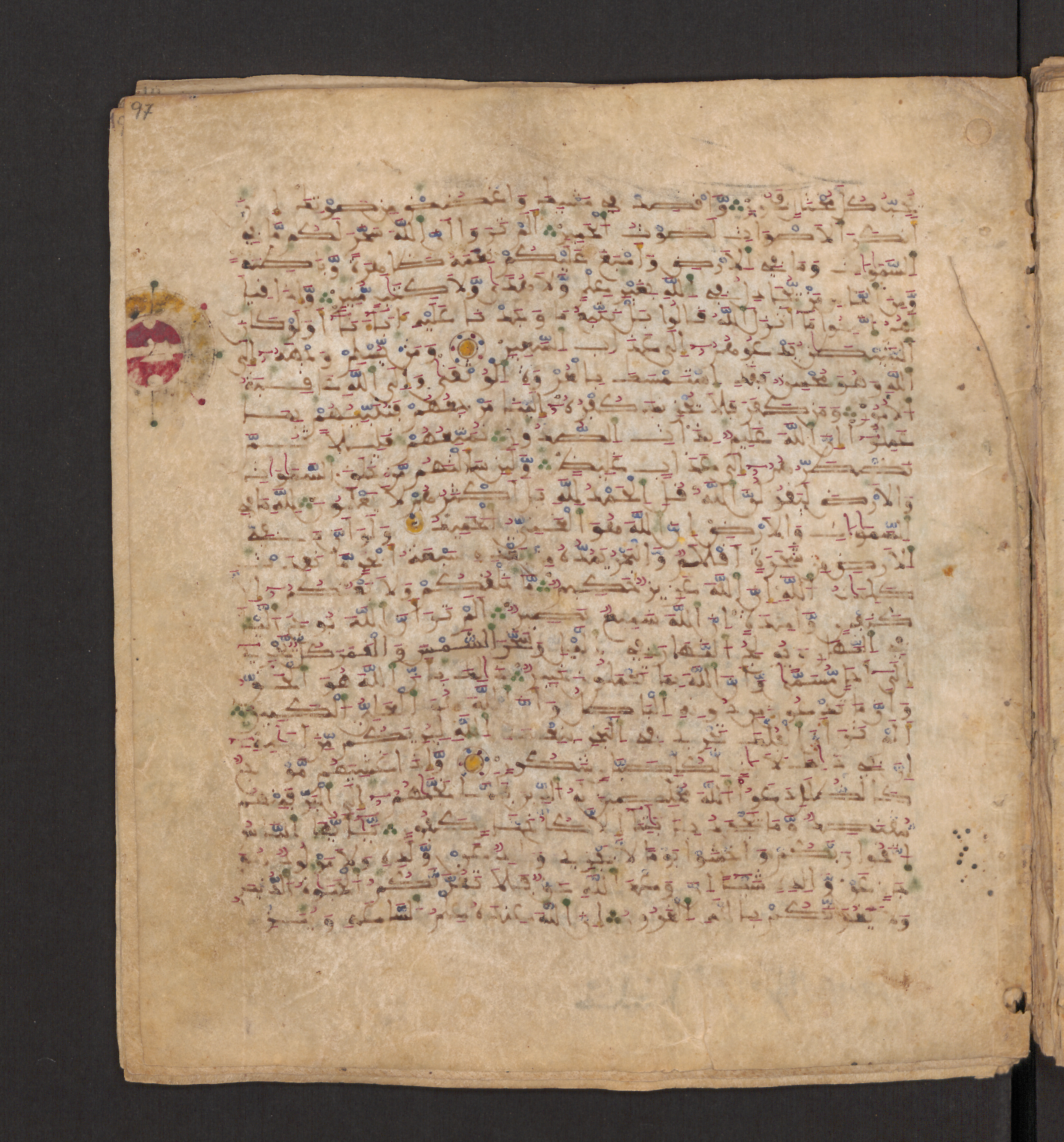 Doha, Qatar National Library, HC.MS.00715, in Maġribī micrography script, showing Surah 31:21 from 11th to 12th Century AD found in Muslim Iberia (al-Andalus), currently housed at Qatar National Library, Doha