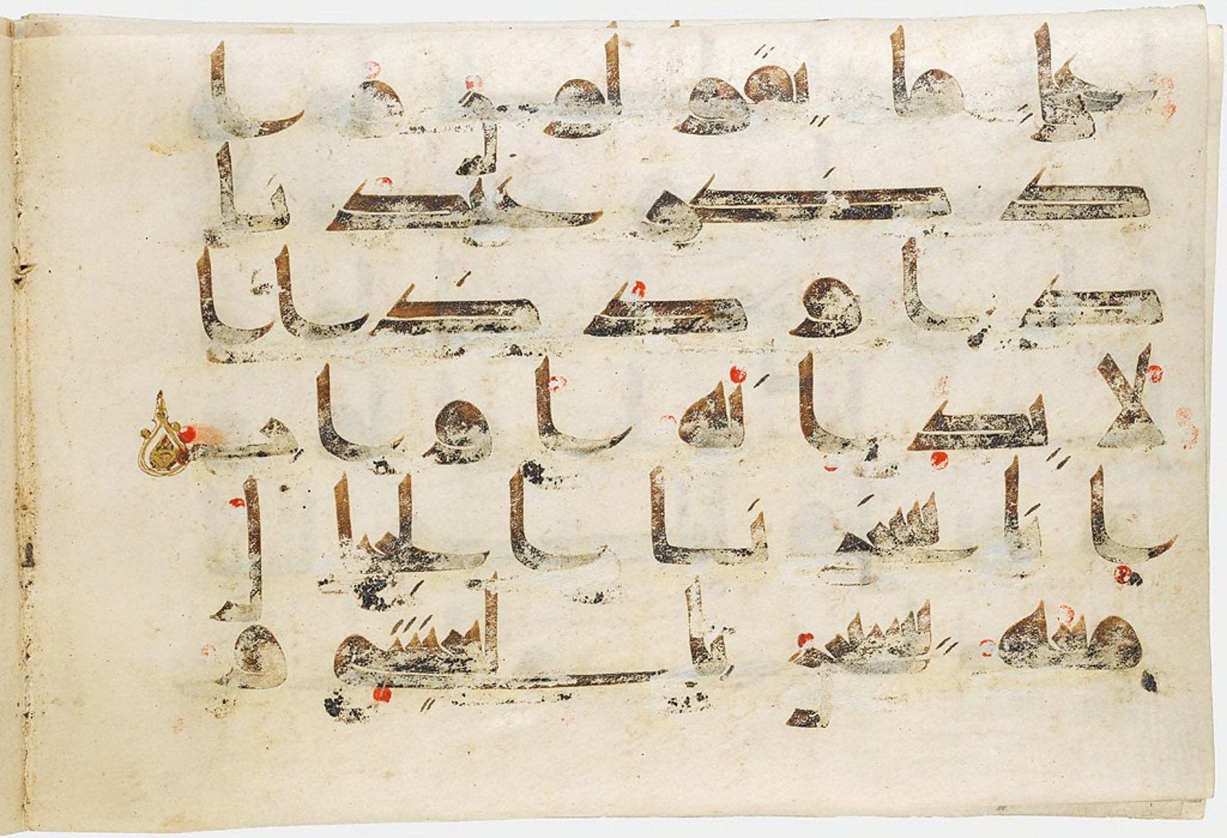 Cambridge, Massachusetts, Harvard Art Museums, 1919.156 (Scan 1), in Kufic script, showing Surah 38:18 from Mid-8th to Late 9th Century AD found in Middle East, currently housed at Harvard Art Museums, Cambridge, Massachusetts
