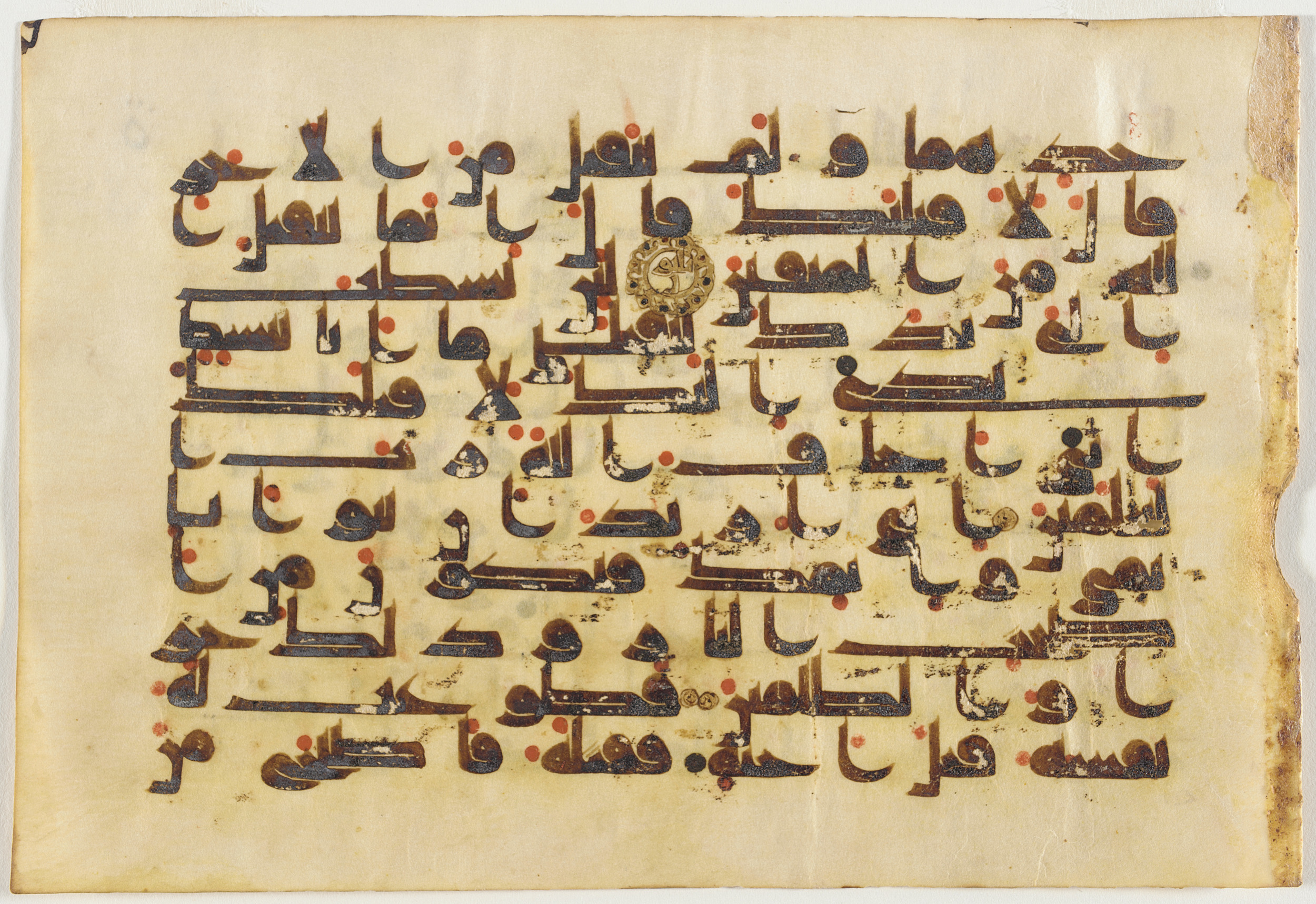 LACMA M.2002.1.394, in Kūfī D script, showing Surah 5:29 from Mid-8th to Late 9th Century AD found in Unknown, currently housed at Los Angeles County Museum of Art, Los Angeles, California