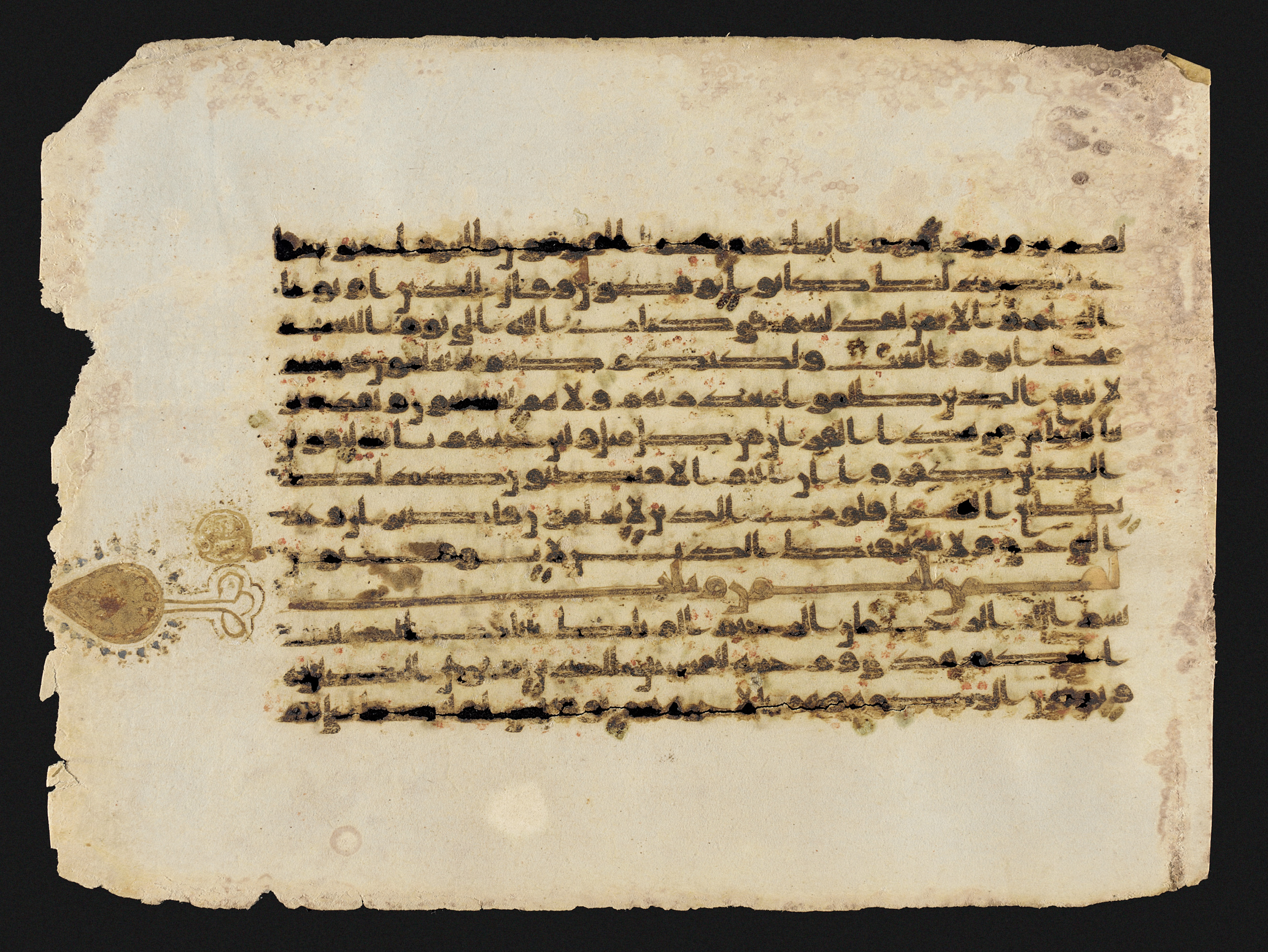 Codex LACMA M.2002.1.388, in Kufic script, showing Surah 31:2 from Mid 8th to Late 9th Century AD found in Unknown, currently housed at Los Angeles County Museum of Art, Los Angeles, California