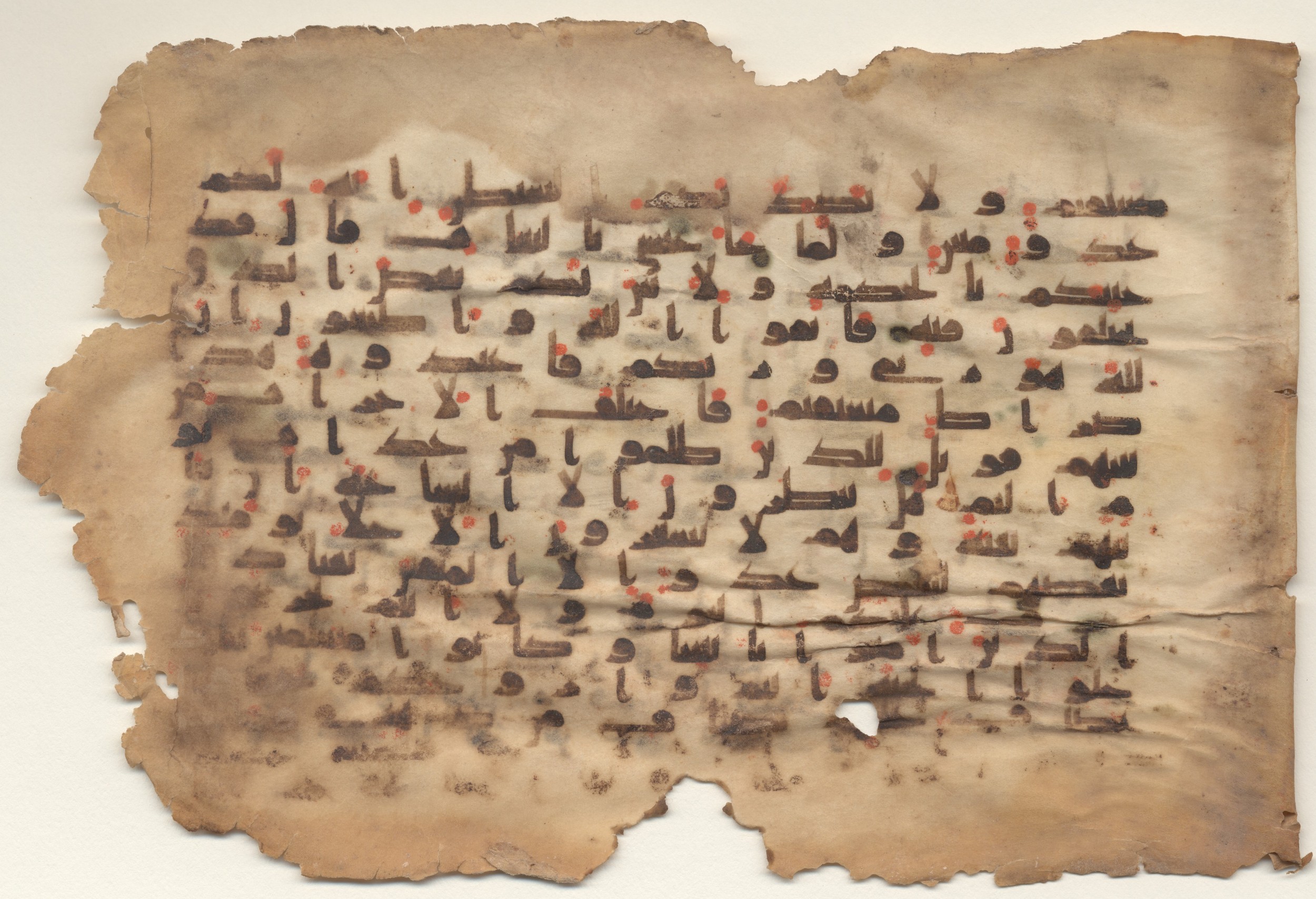 Brown University Library Minassian Collection Codex (Scan 1), in kūfī B.II script, showing Surah 43:61 from Late 8th to 9th Century AD found in Unknown, currently housed at Brown University Library, Providence, Rhode Island