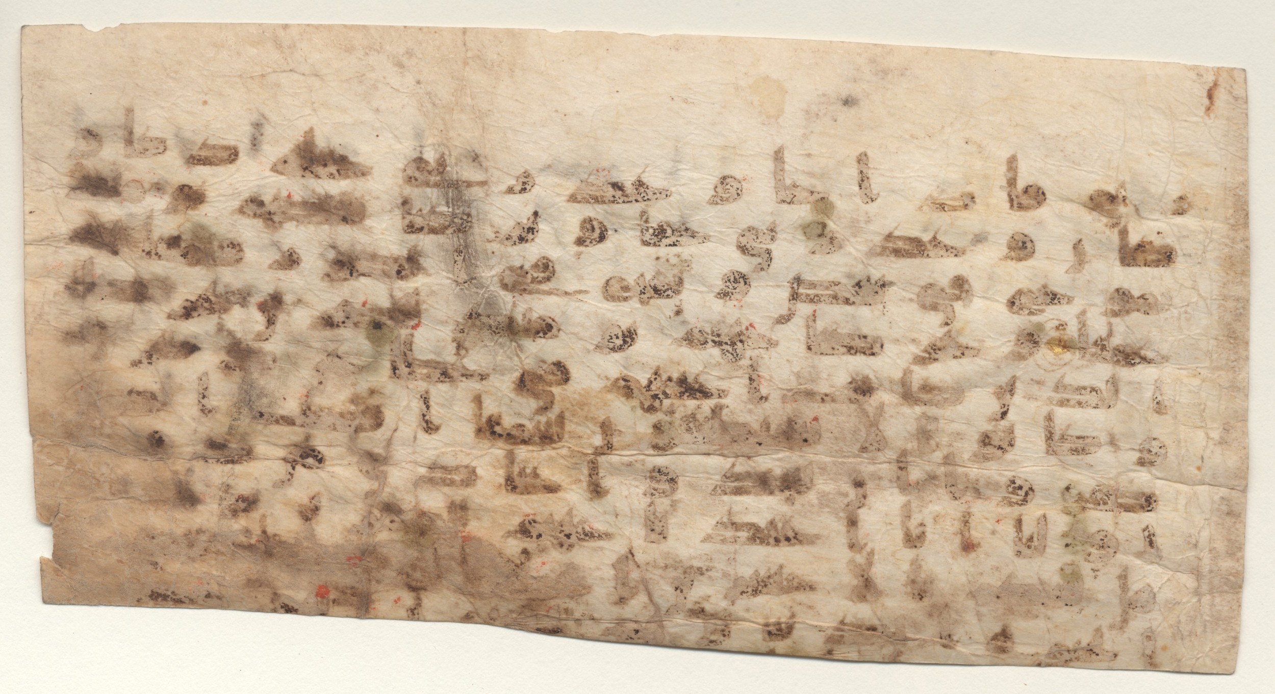 Providence, Rhode Island, Brown University Library, 6566, in kūfī B.II script, showing Surah 18:98 from 8th to 9th Century AD found in Unknown, currently housed at Brown University Library, Providence, Rhode Island