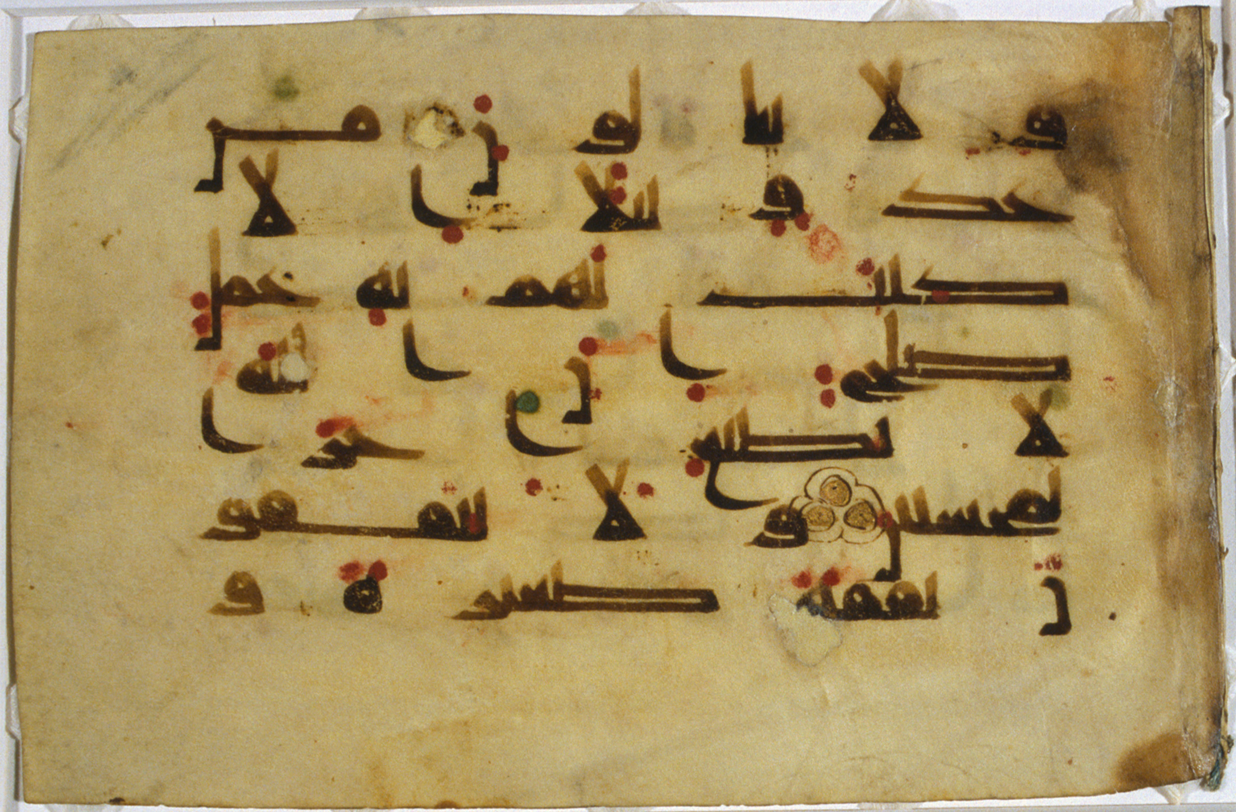 Library of Congress 1-84-154.28a (Scan 1), in Kūfī Type D script, showing Surah 9:121 from Mid 8th to Mid 10th Century AD found in Unknown, currently housed at Library of Congress, Washington DC