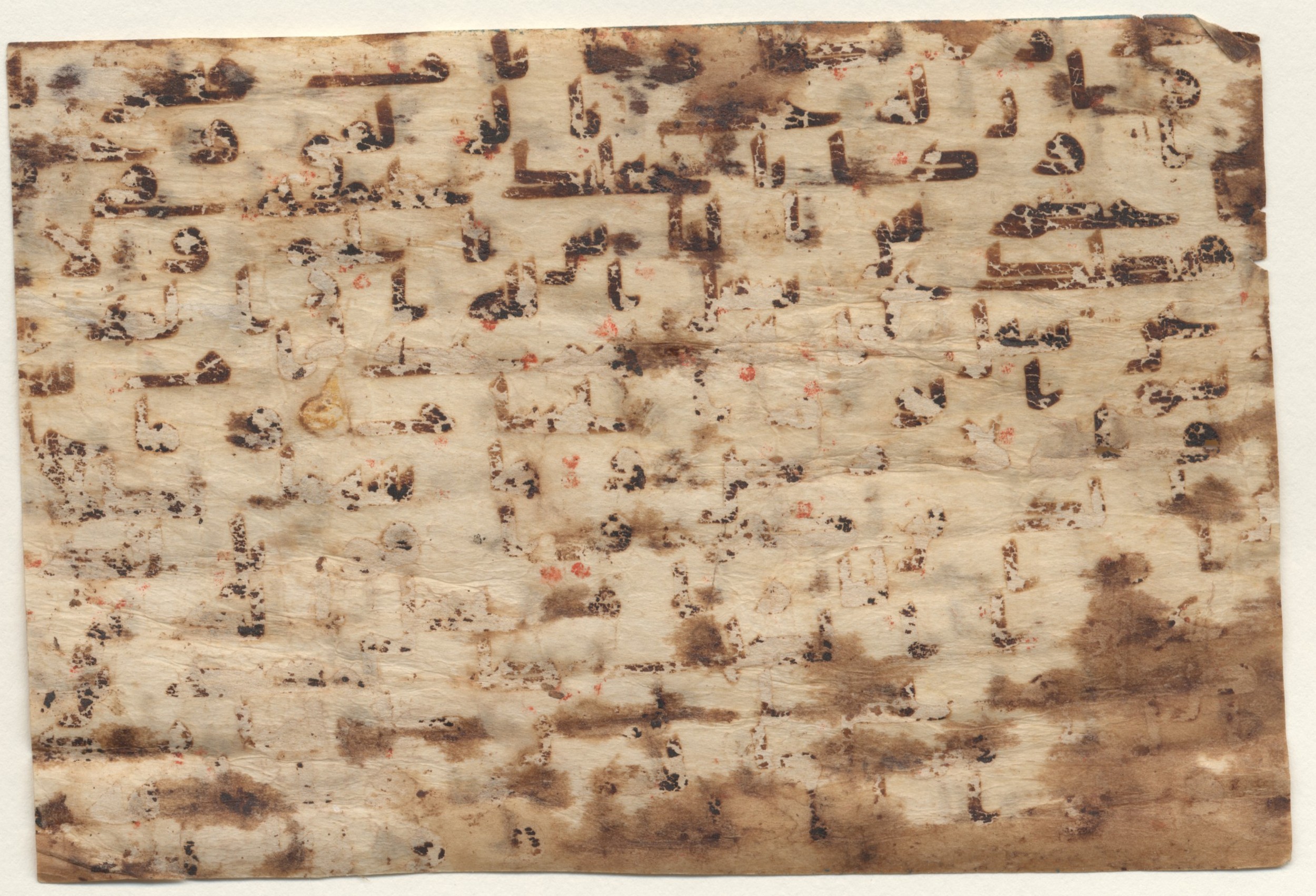Providence, Rhode Island, Brown University Library, 6455, in kūfī B.II script, showing Surah 32:18 from Late 8th / Early 9th Century AD found in Unknown, currently housed at Brown University Library, Providence, Rhode Island