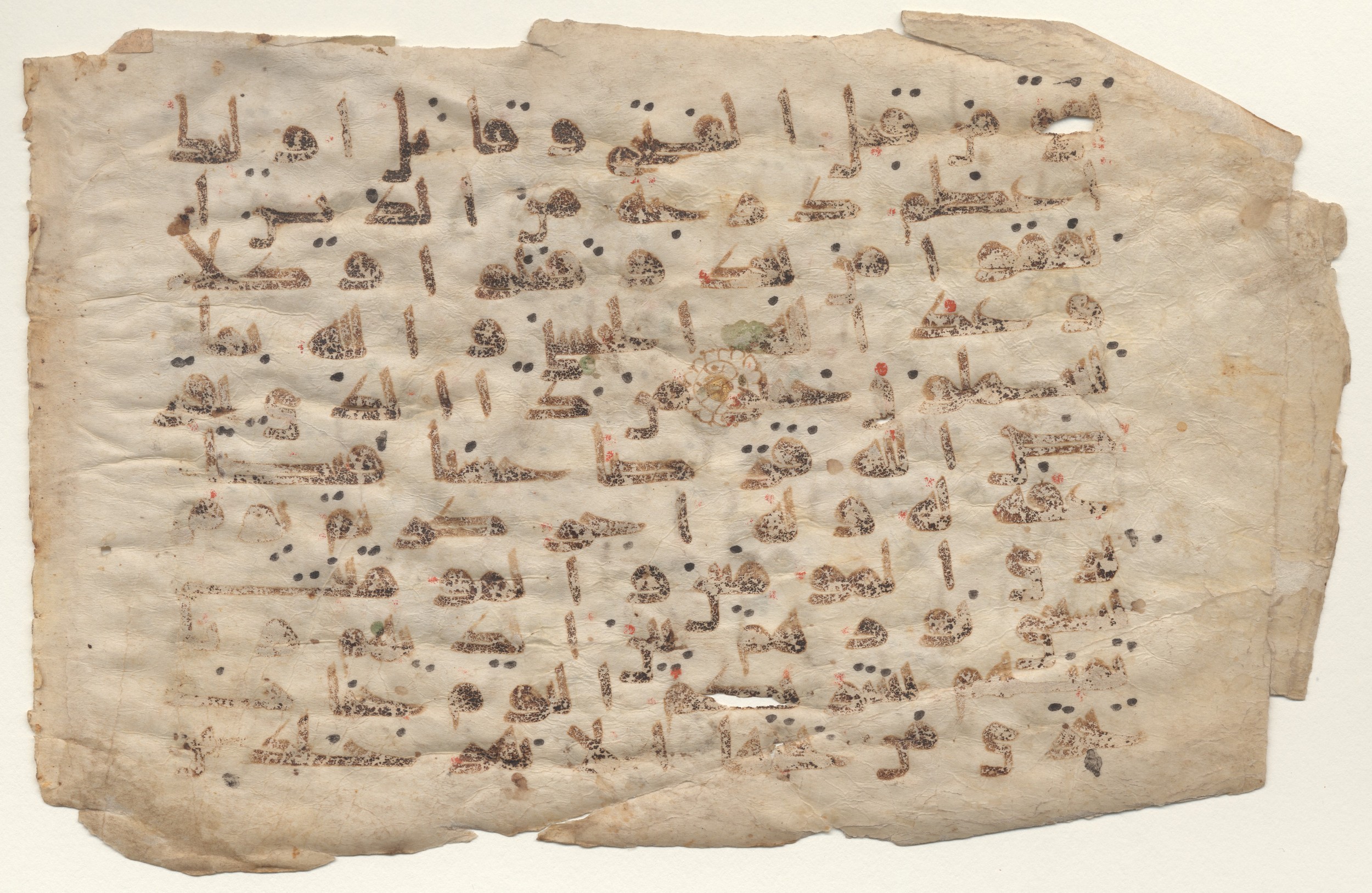 Providence, Rhode Island, Brown University Library, 6128 (Scan 2), in kūfī E.I script, showing Surah 57:10 from Late 8th to 9th Century AD found in Unknown, currently housed at Brown University Library, Providence, Rhode Island, USA