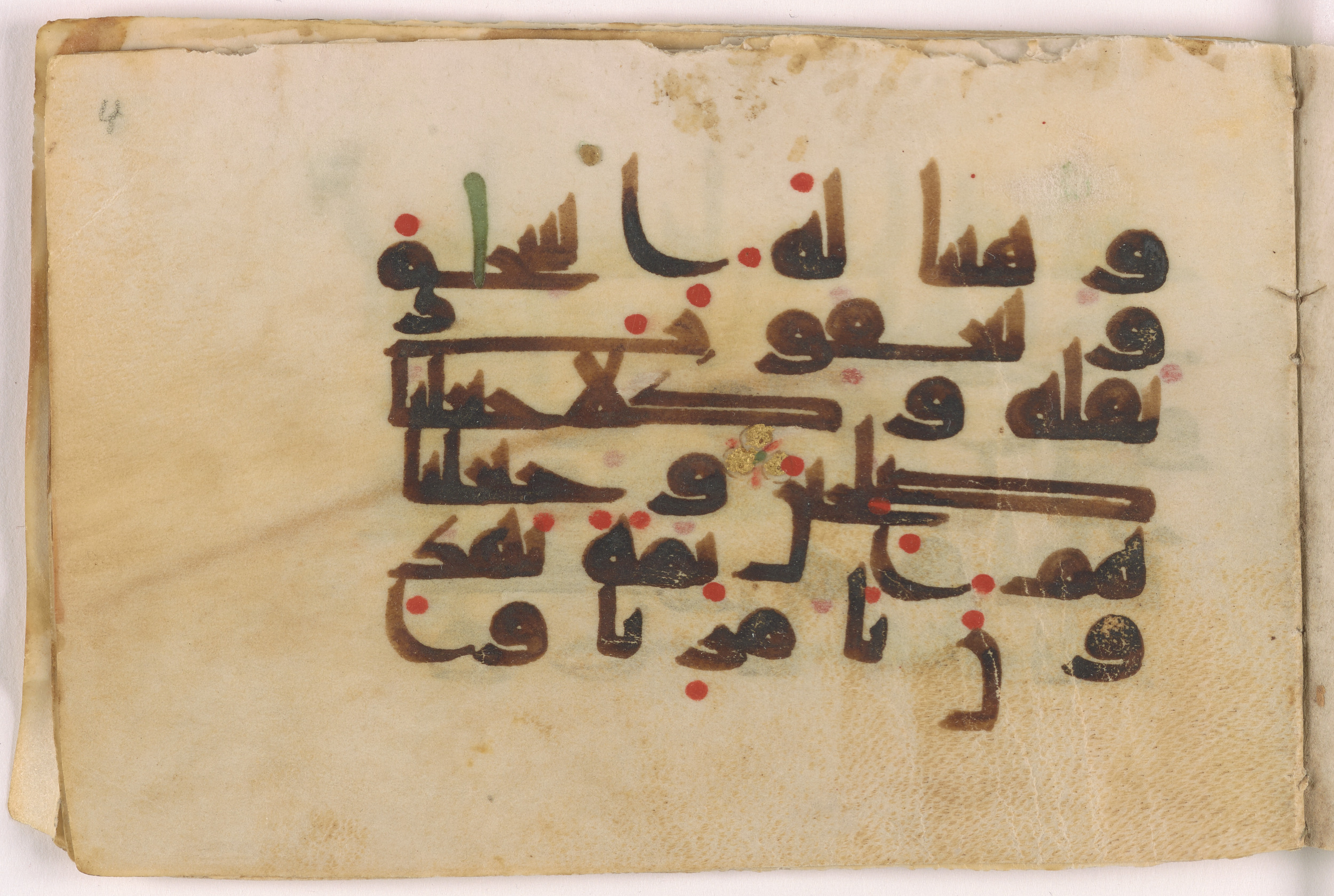 Doha, Qatar National Library, HC.MS.03160 (Scan 1), in Kūfī D script, showing Surah 21:73 from Mid 8th to Late 9th Century AD found in Unknown, currently housed at Qatar National Library, Doha