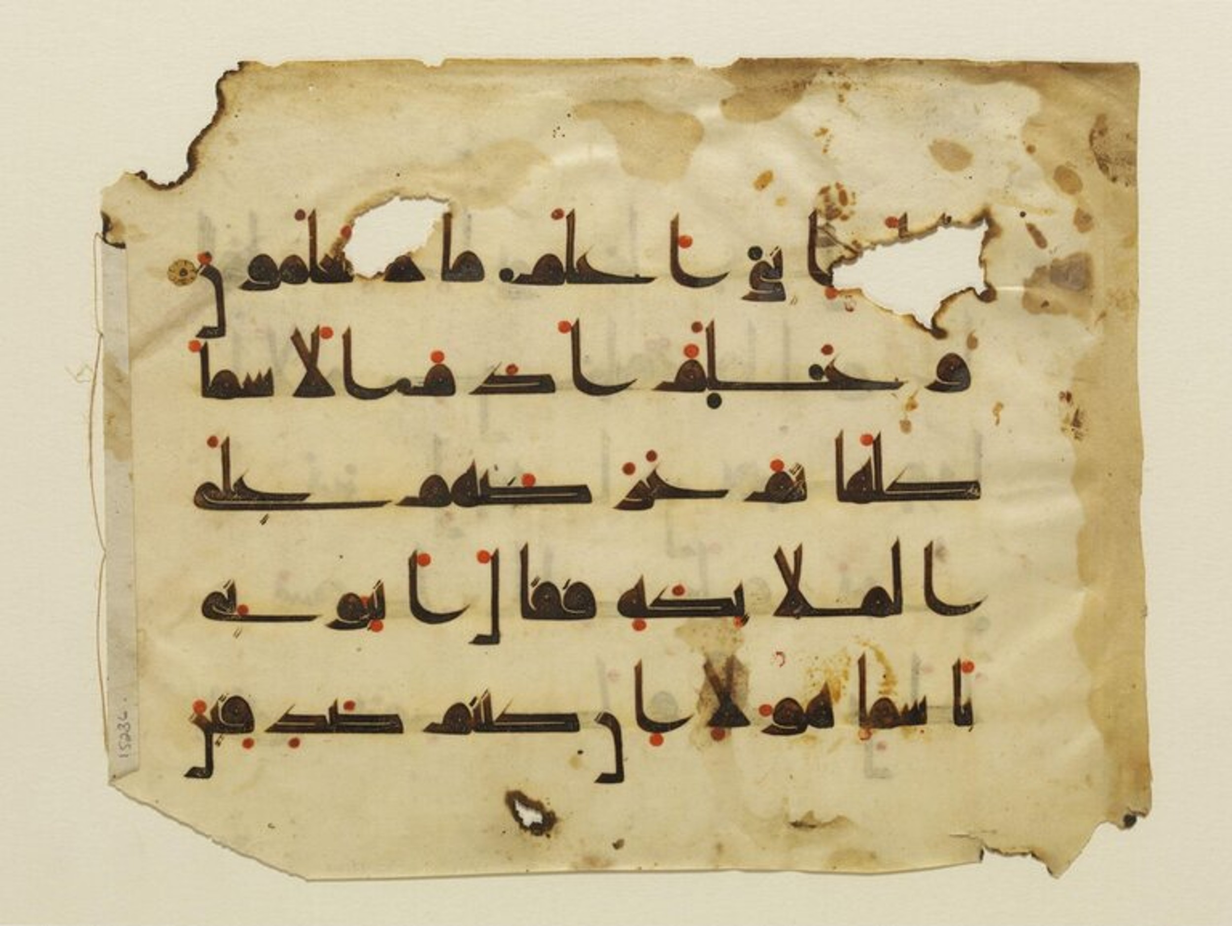 Victoria and Albert Museum ME.12-2013 (Scan 2), in Kūfī D.I script, showing Surah 2:30 from Mid 8th to Late 9th Century AD found in Unknown, currently housed at Victoria and Albert Museum, London