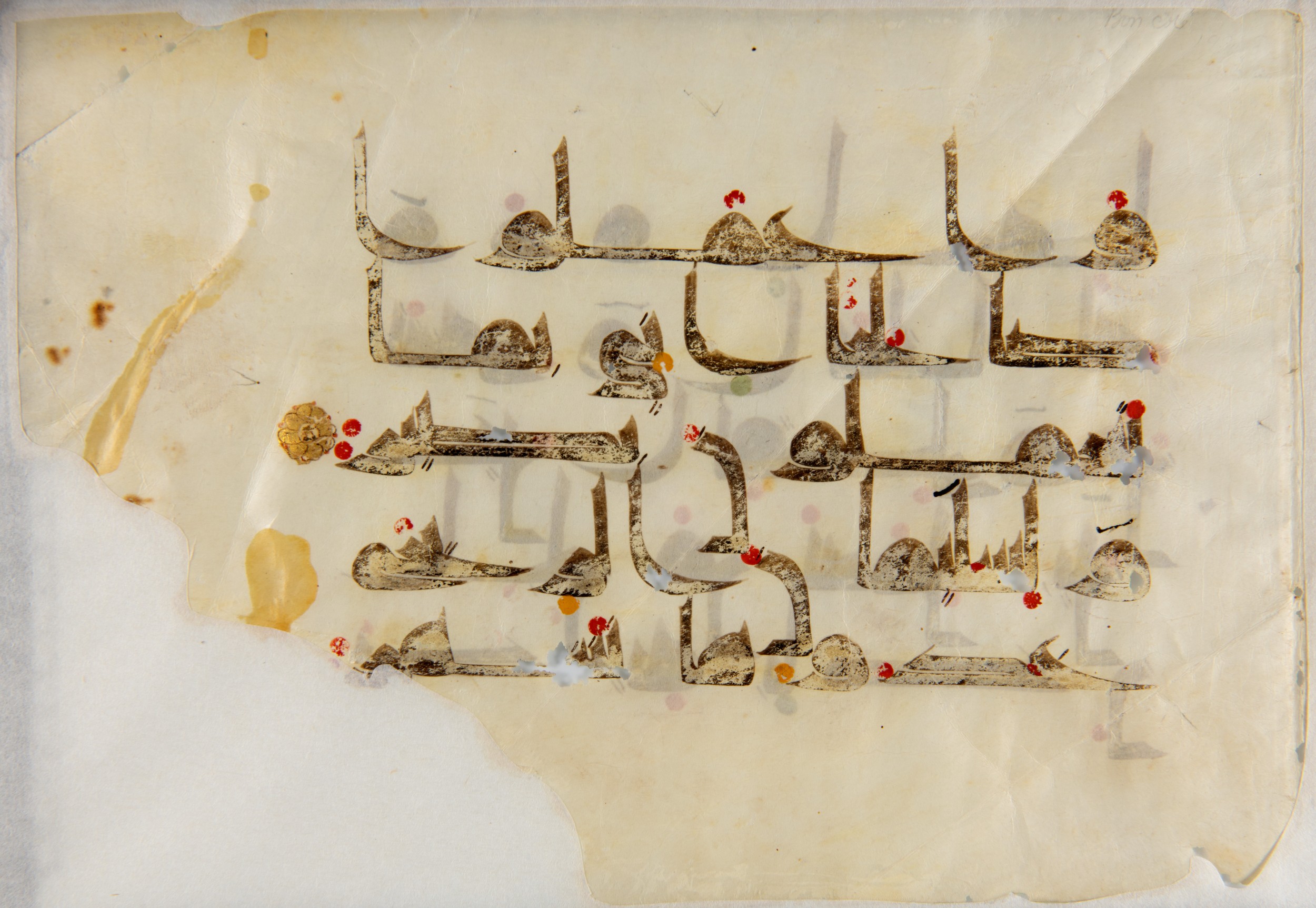 Wereldmuseum WM-ONG-164 (Scan 1), in Kūfī D script, showing Surah 34:12 from Mid 8th to Late 9th Century AD found in Unknown, currently housed at Wereldmuseum, Leiden, Rotterdam, Amsterdam
